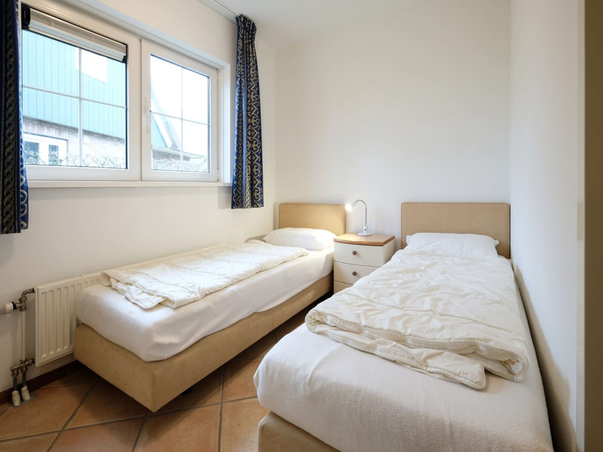 Een slaapkamer van Anzelhoef 28 in Sint Maartenszee