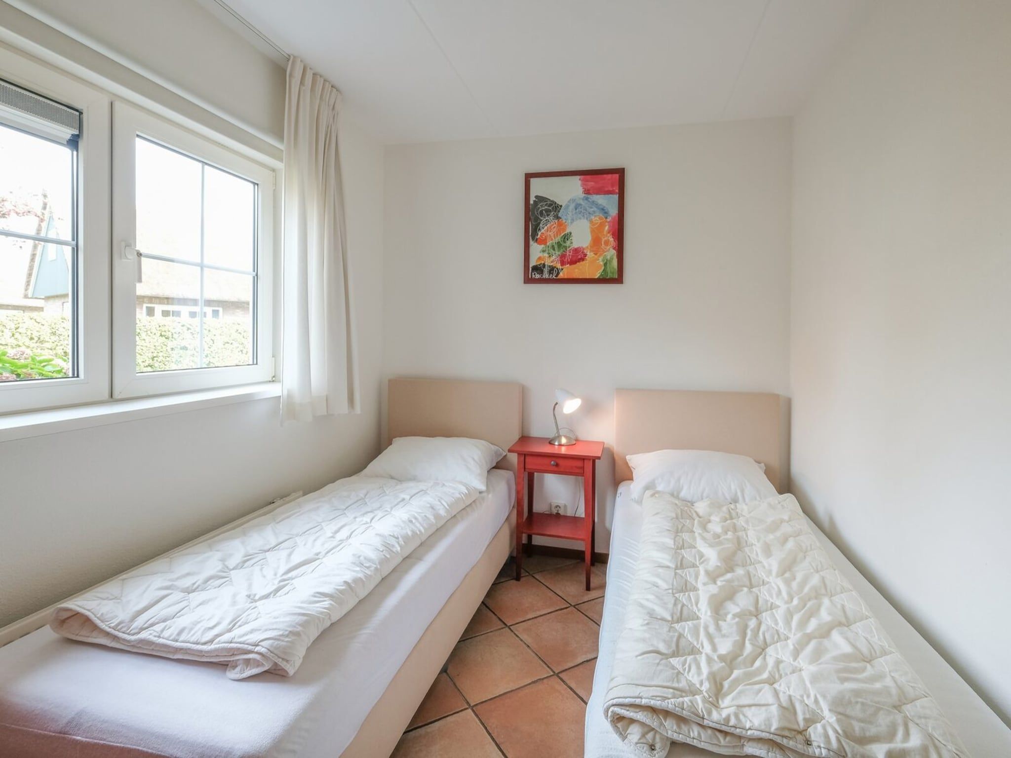 Een slaapkamer van Anzelhoef 30 in Sint Maartenszee