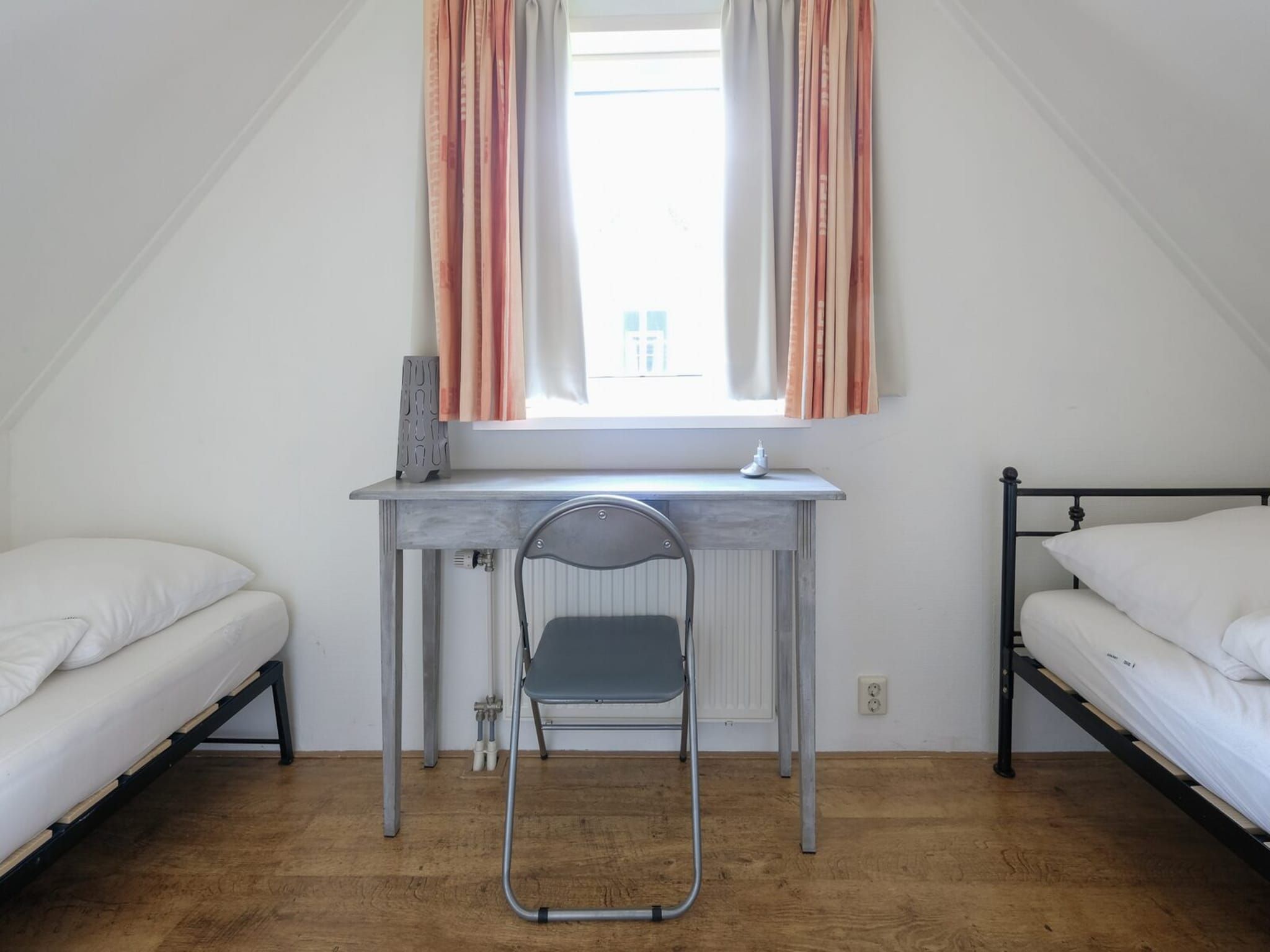 Een slaapkamer van Anzelhoef 30 in Sint Maartenszee