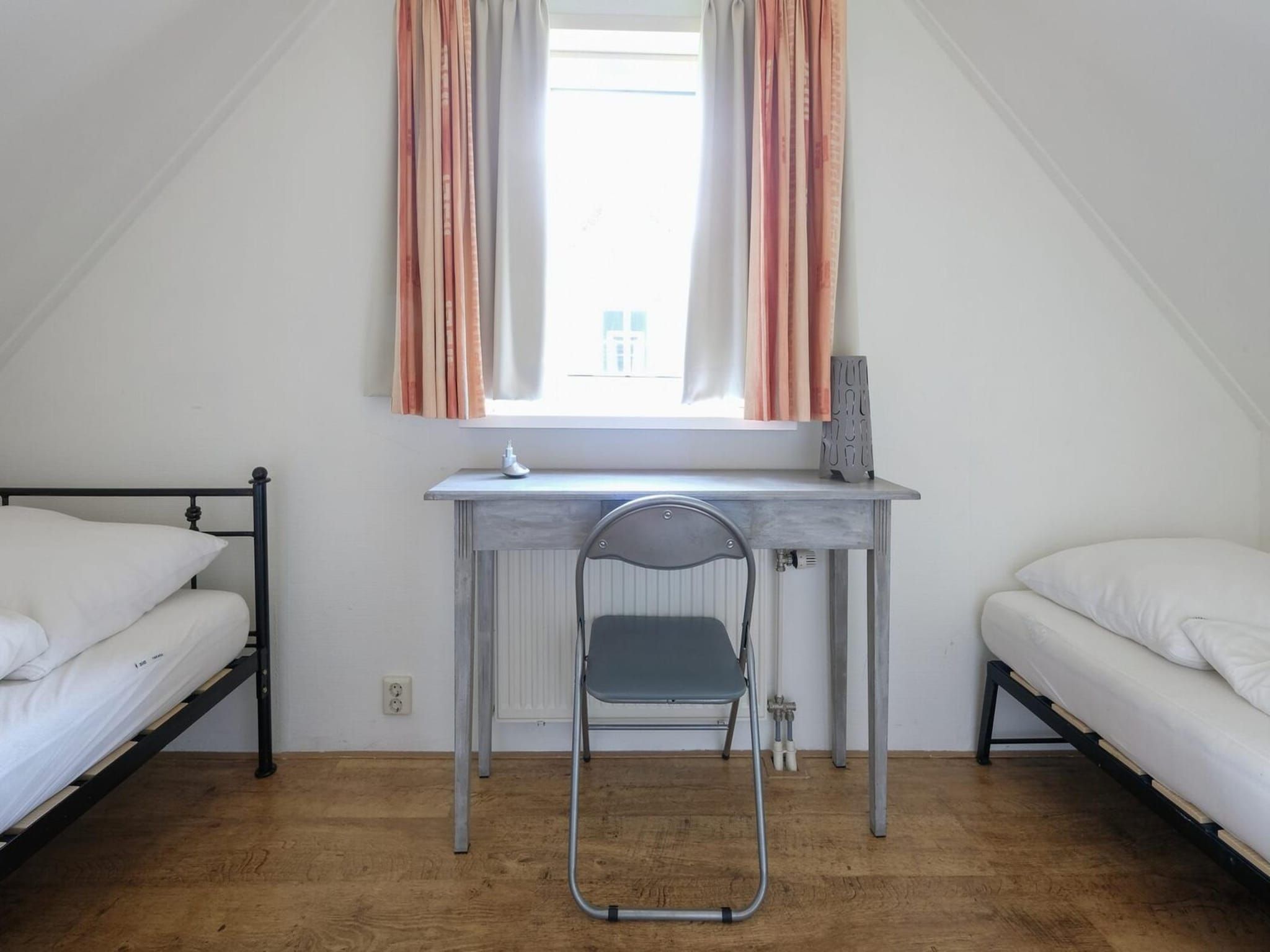 Een slaapkamer van Anzelhoef 30 in Sint Maartenszee