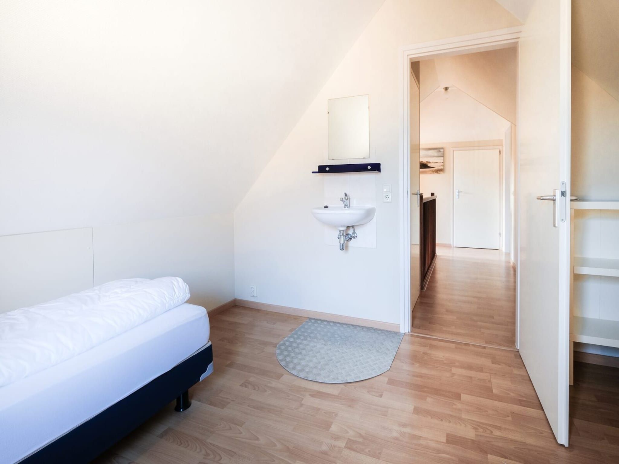 Een slaapkamer van Anzelhoef 31 in Sint Maartenszee