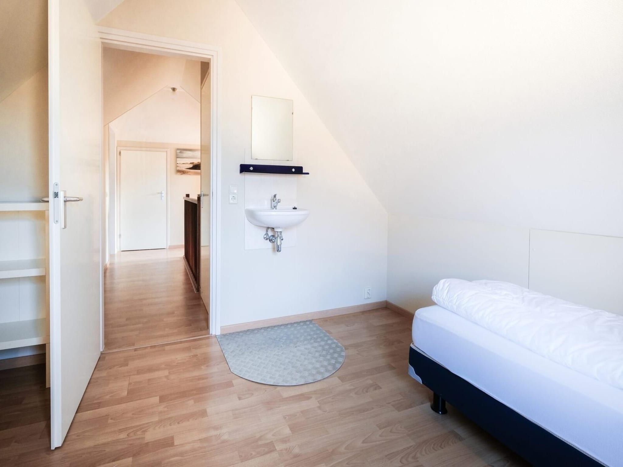 Een slaapkamer van Anzelhoef 31 in Sint Maartenszee