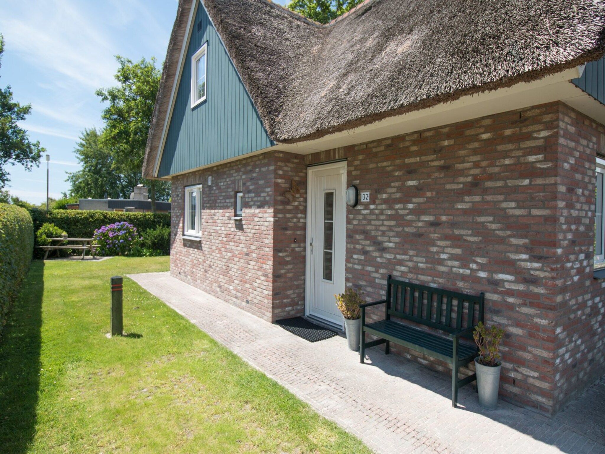 De buitenkant van Anzelhoef 32 in Sint Maartenszee