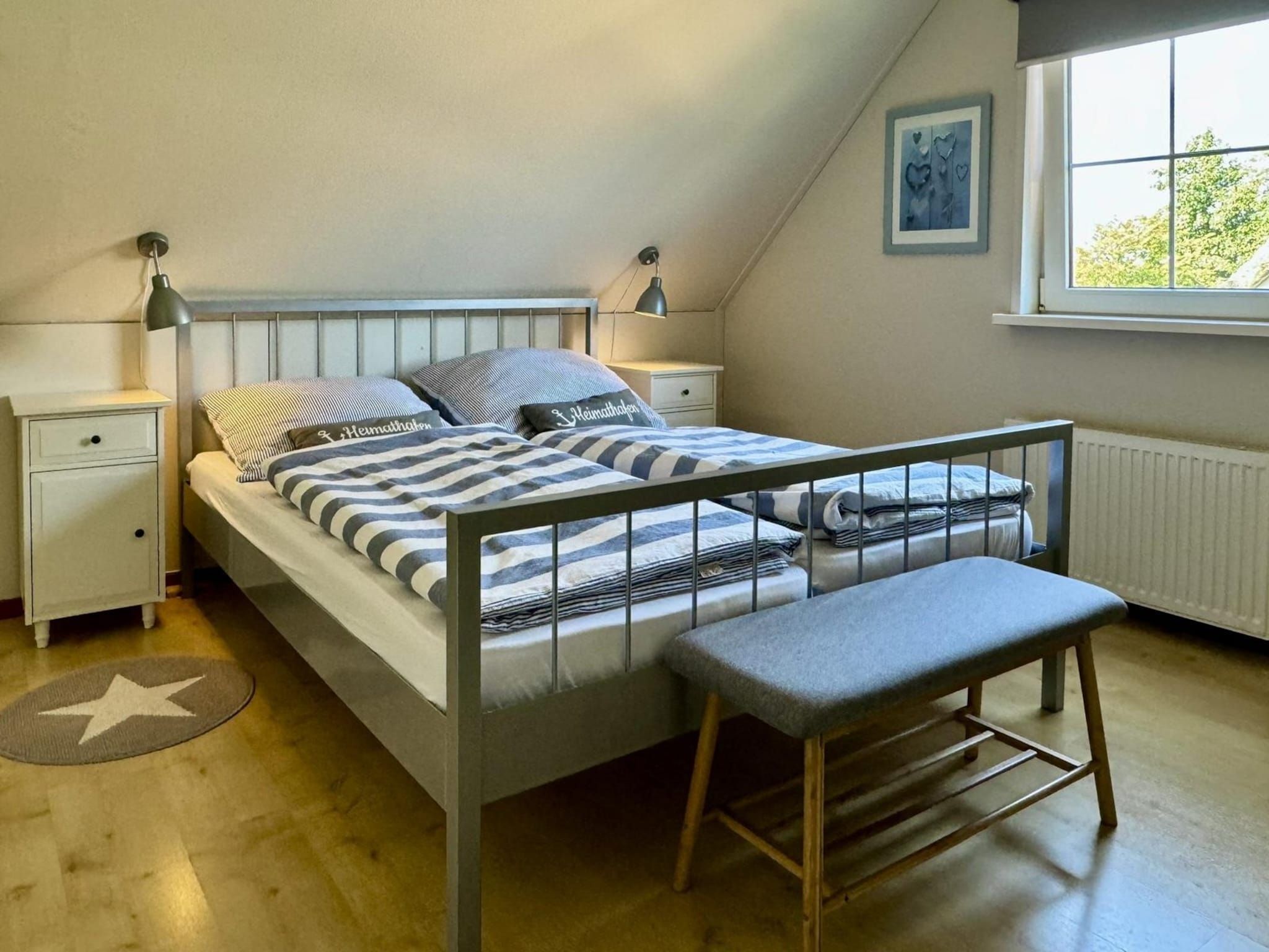 Een slaapkamer van Anzelhoef 32 in Sint Maartenszee