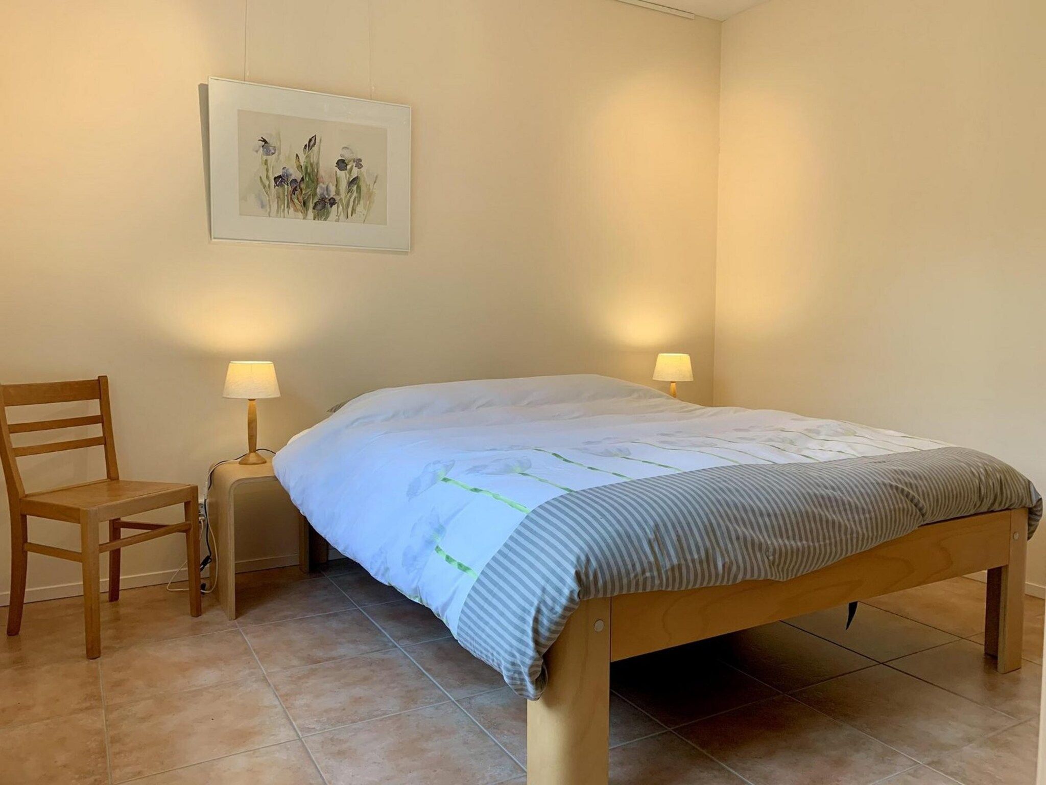 Een slaapkamer van Campanula 11 in Sint Maartenszee