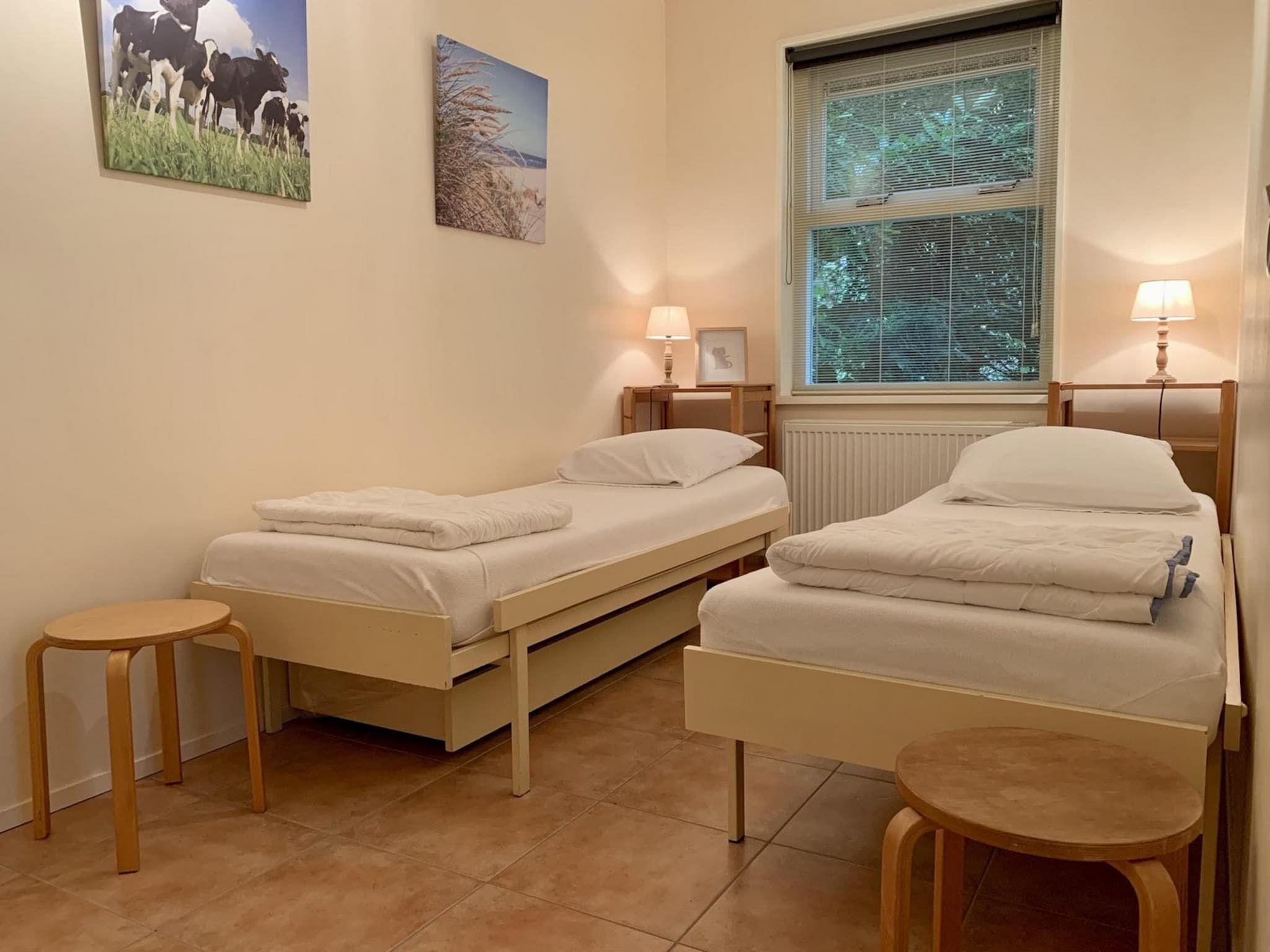 Een slaapkamer van Campanula 11 in Sint Maartenszee