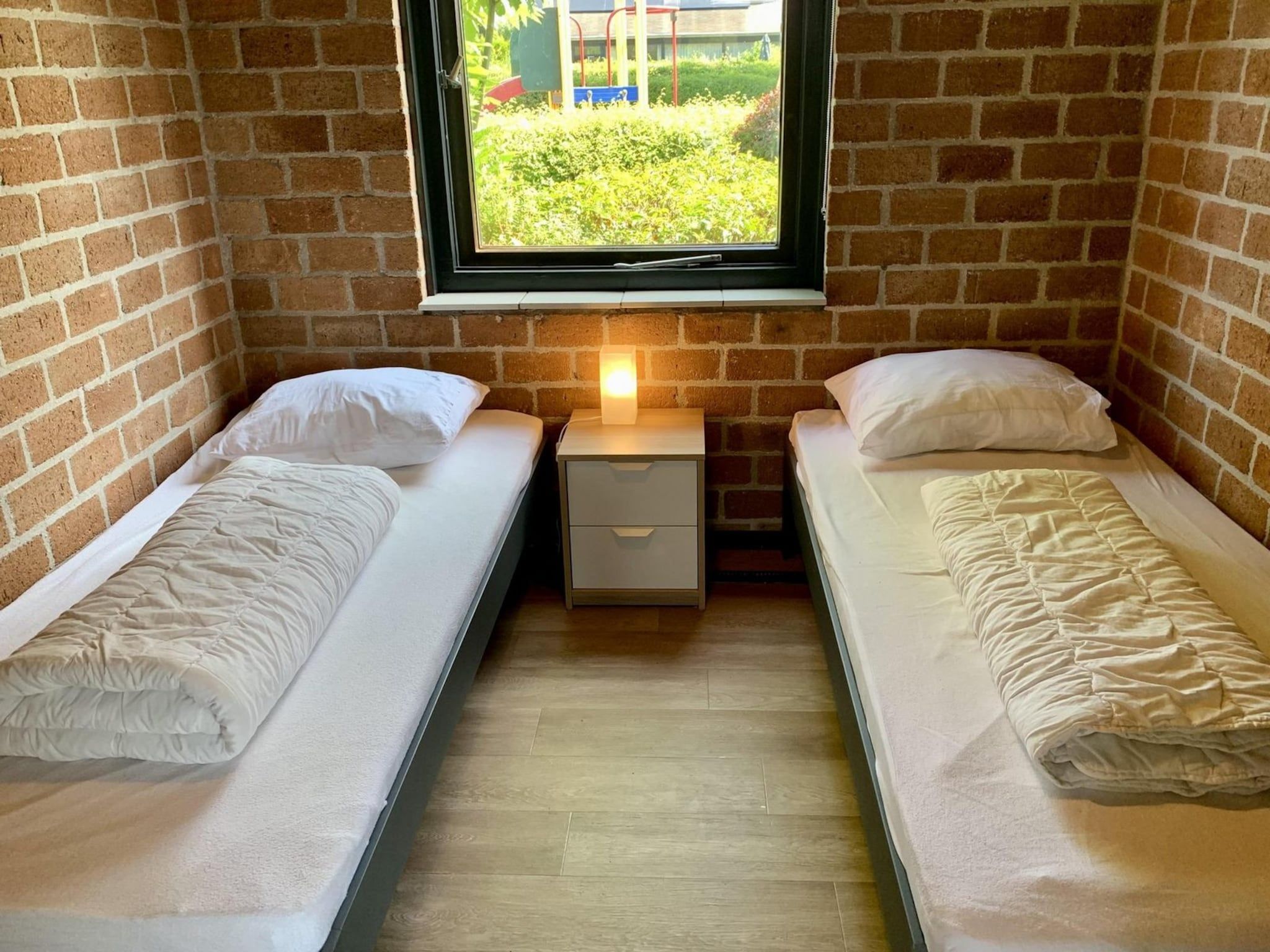 Een slaapkamer van Boerenslag 23 in Sint Maartenszee