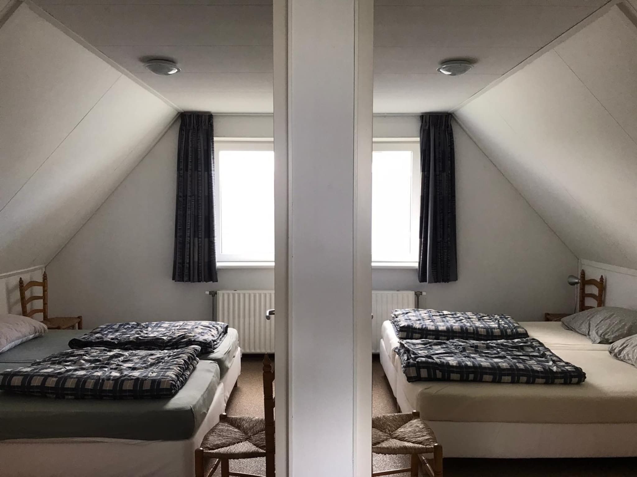 Een slaapkamer van Bohemien 27 in Sint Maartenszee