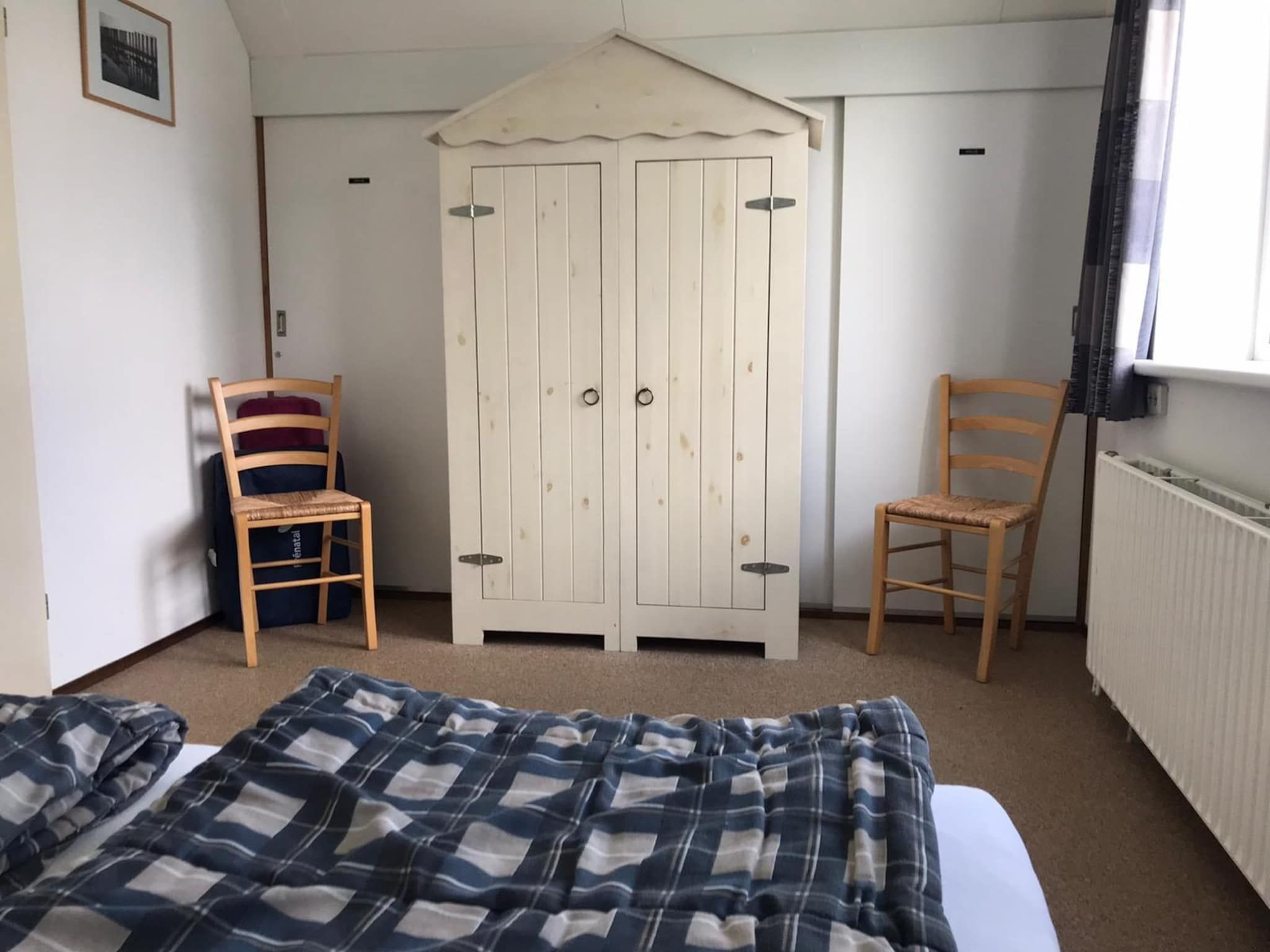 Een slaapkamer van Bohemien 27 in Sint Maartenszee