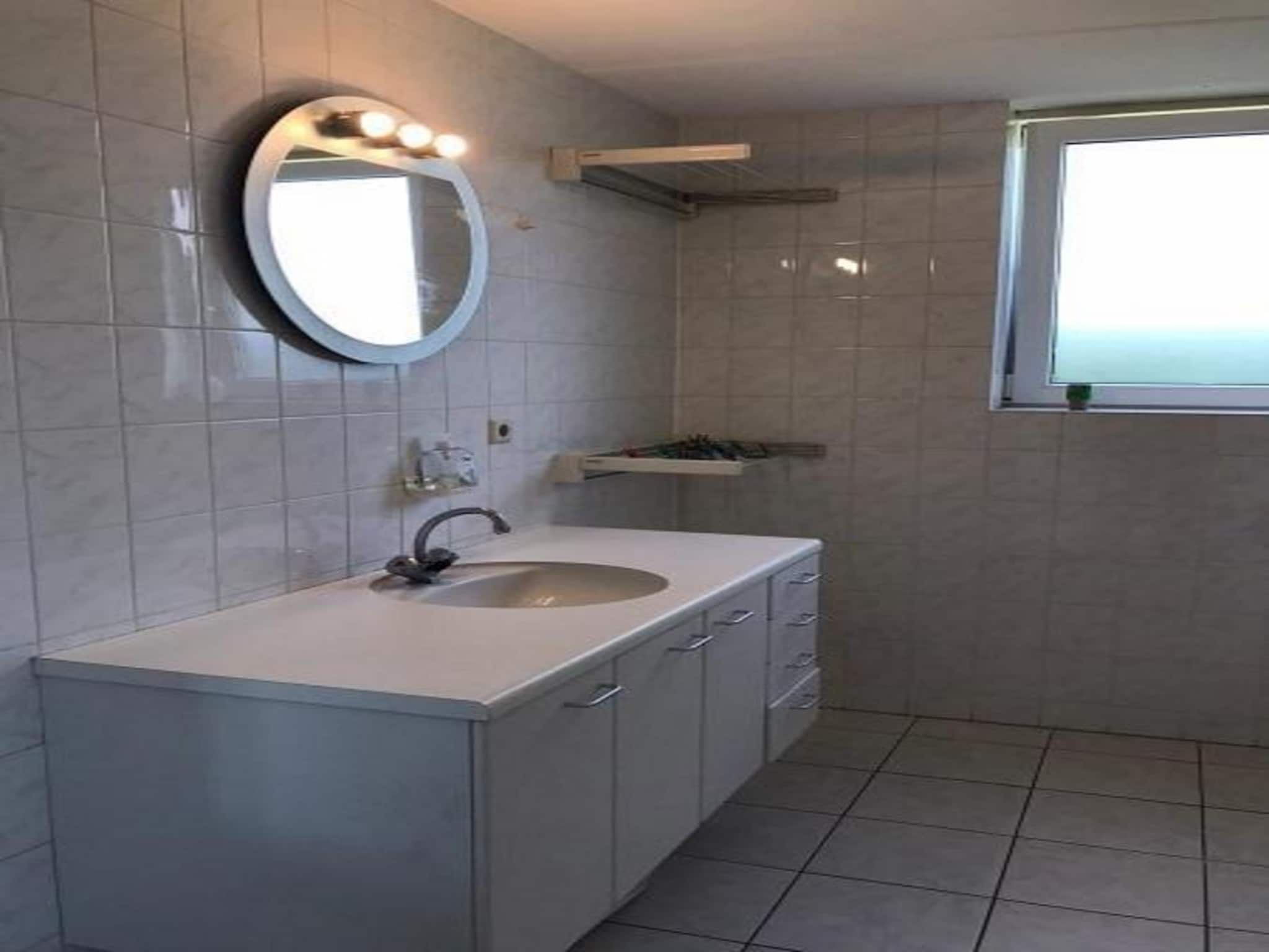 Een slaapkamer van Bohemien 27 in Sint Maartenszee