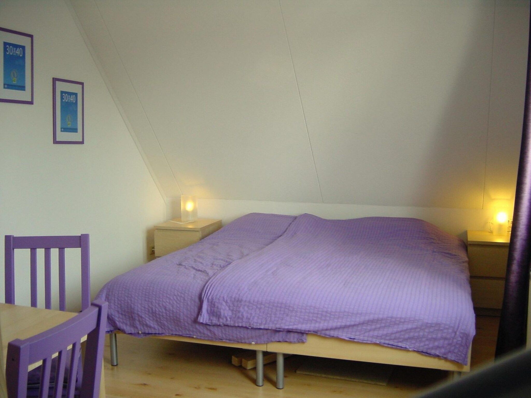 Een slaapkamer van Bohemien 38 in Sint Maartenszee