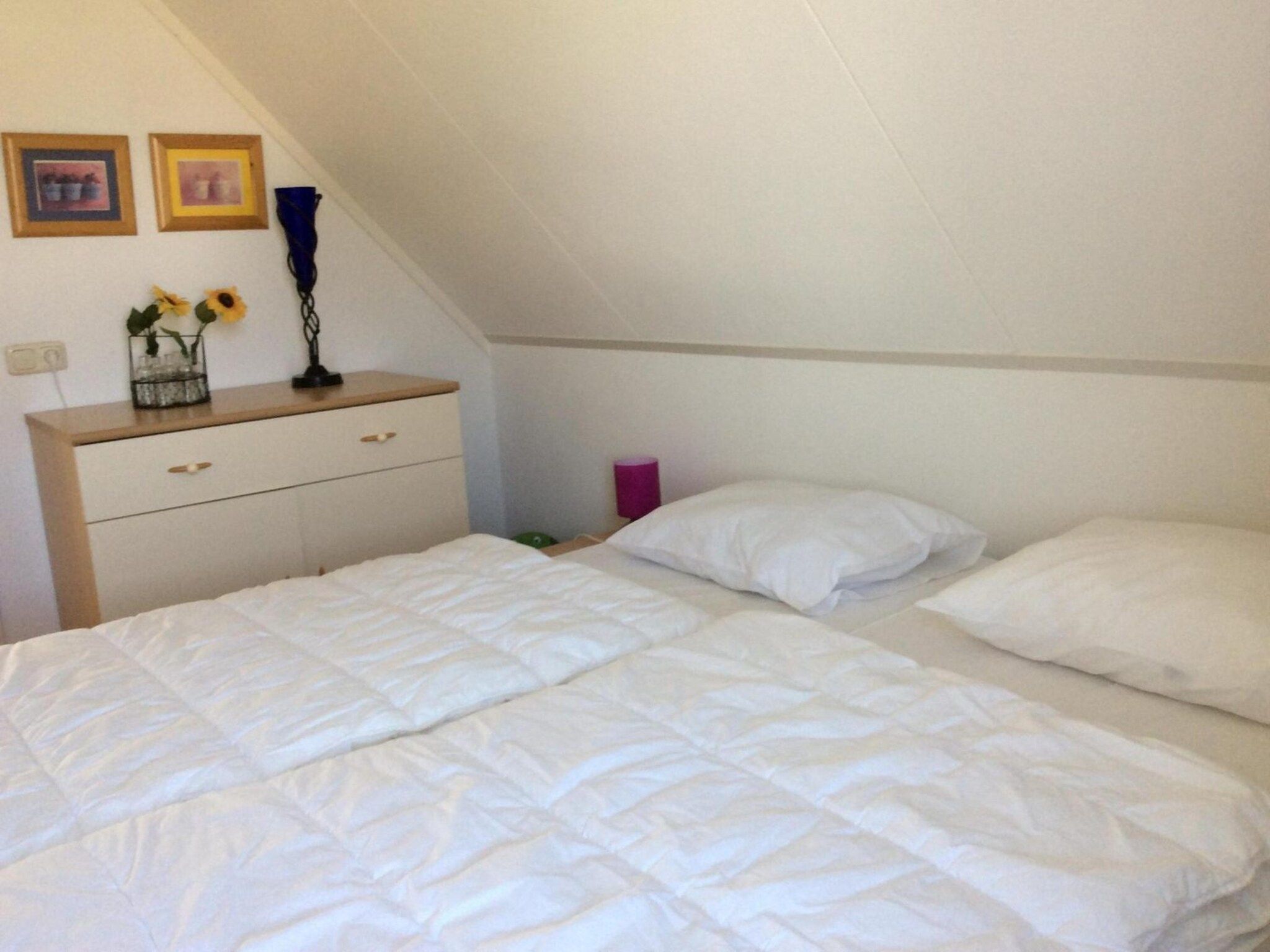 Een slaapkamer van Bohemien 39 in Sint Maartenszee