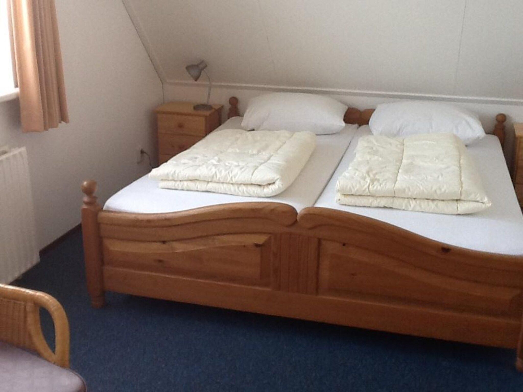 Een slaapkamer van Bohemien 40 in Sint Maartenszee