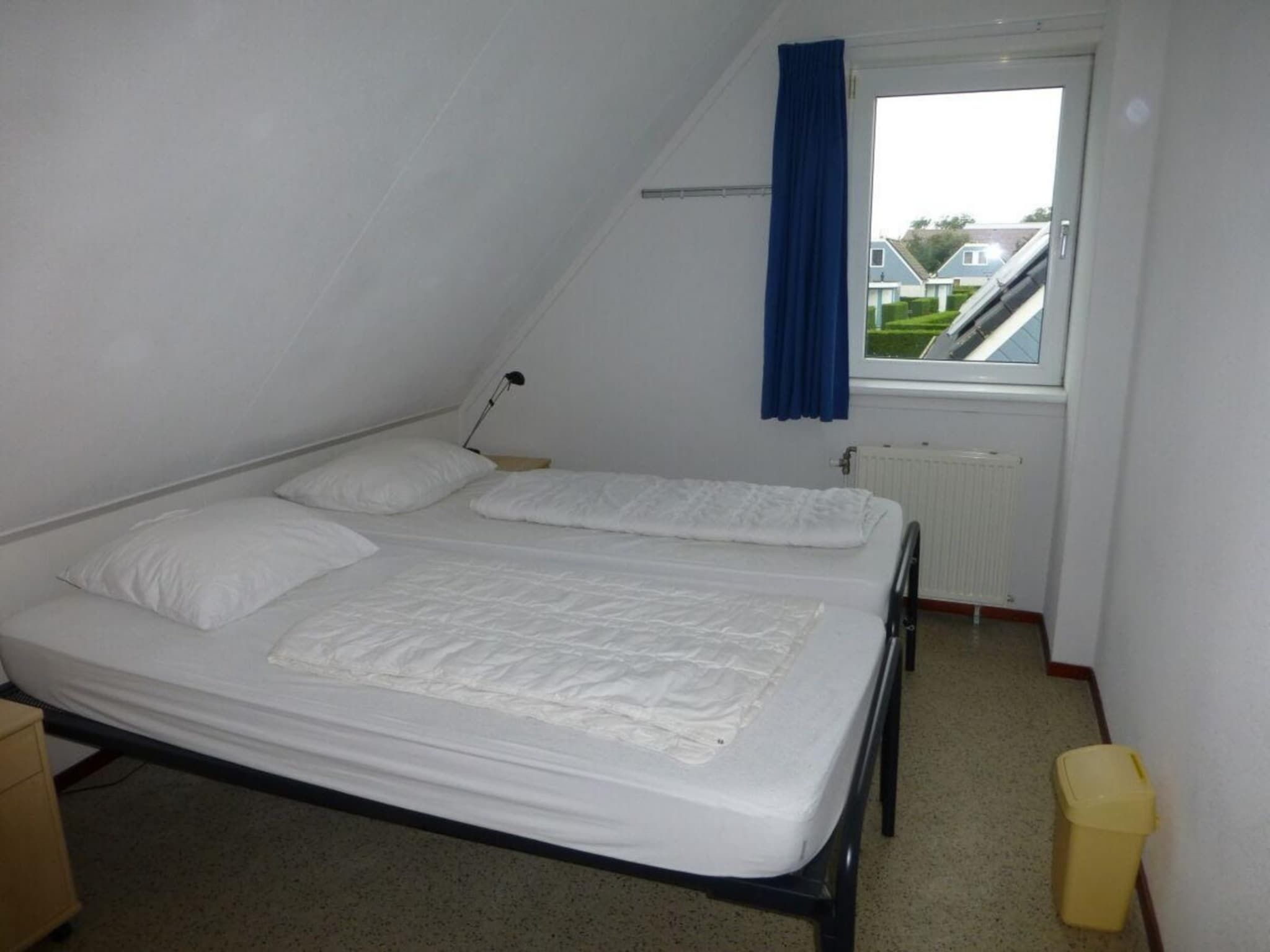 Een slaapkamer van Bohemien 47 in Sint Maartenszee
