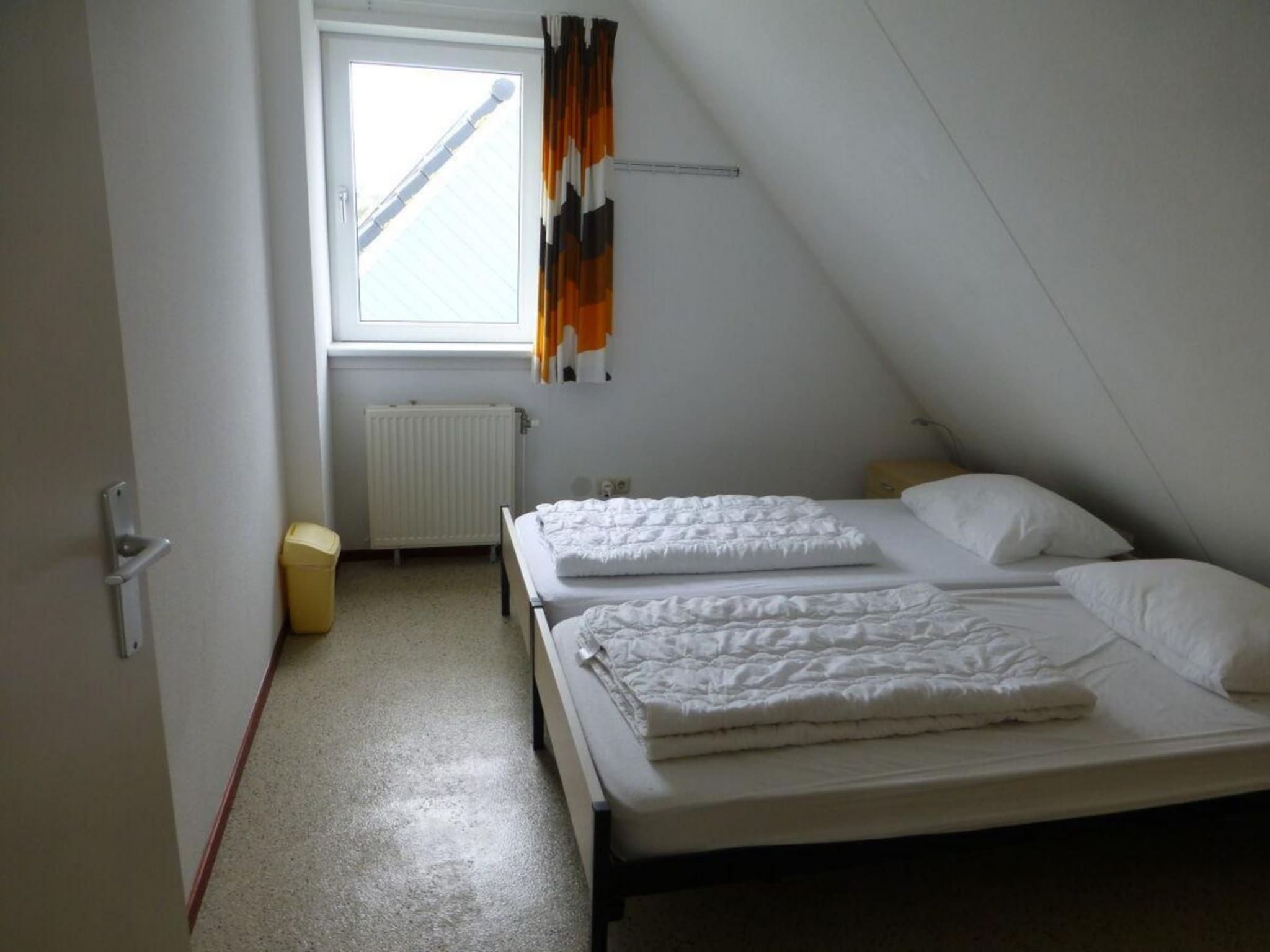 Een slaapkamer van Bohemien 47 in Sint Maartenszee