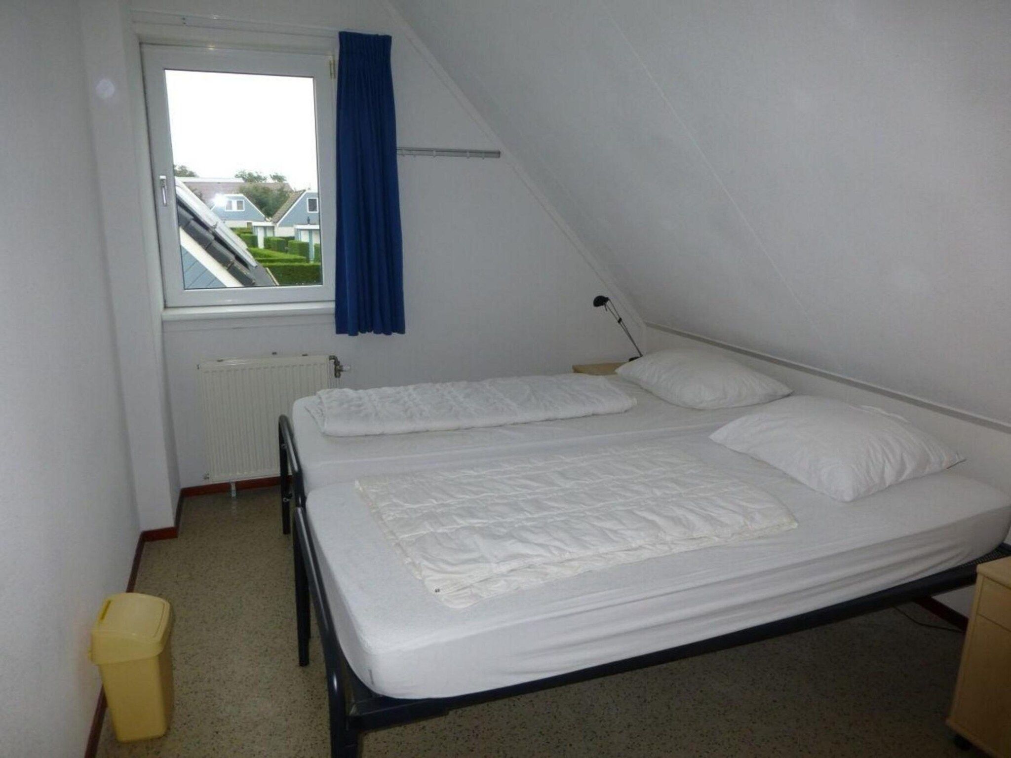 Een slaapkamer van Bohemien 47 in Sint Maartenszee