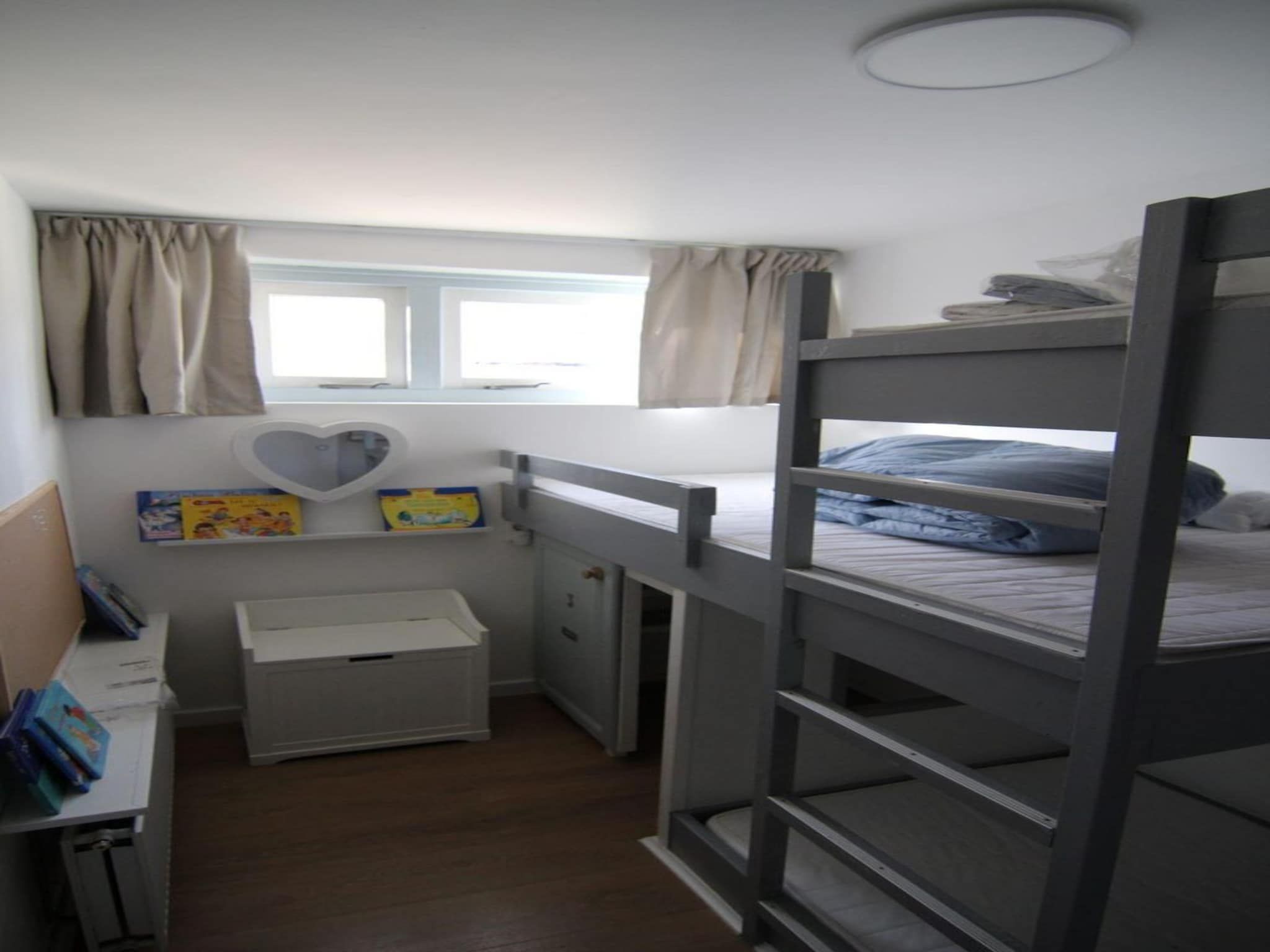 Een slaapkamer van Duinland 248 in Sint Maartenszee