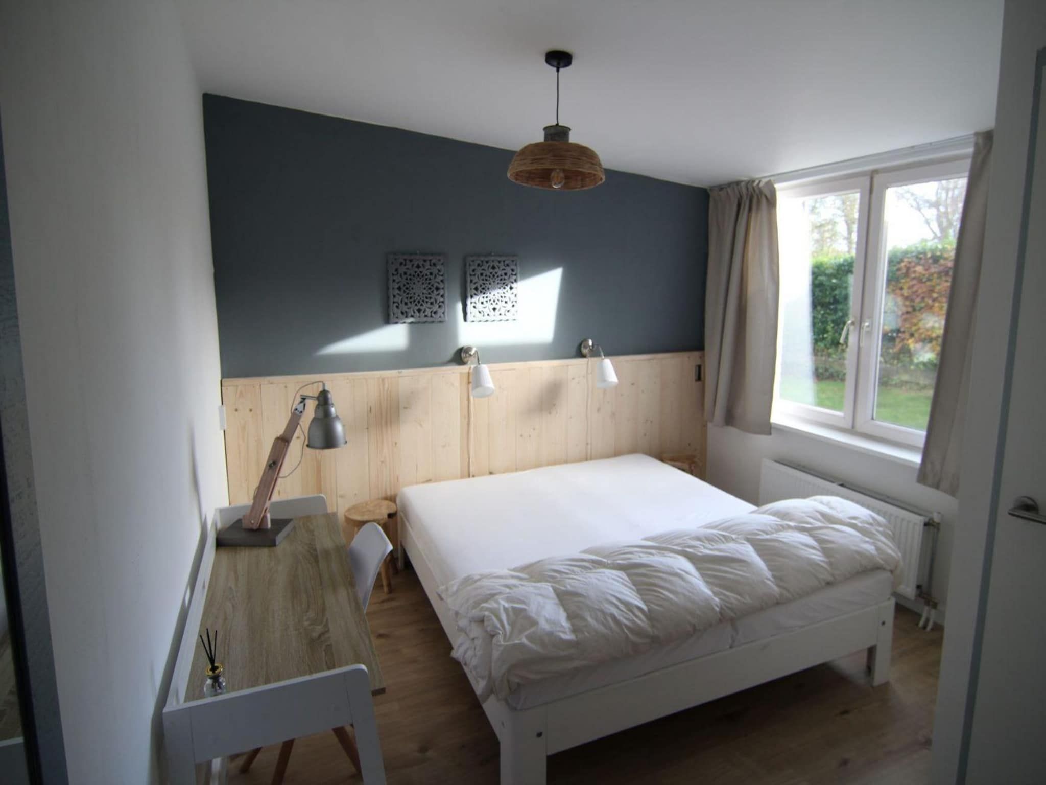 Een slaapkamer van Duinland 248 in Sint Maartenszee