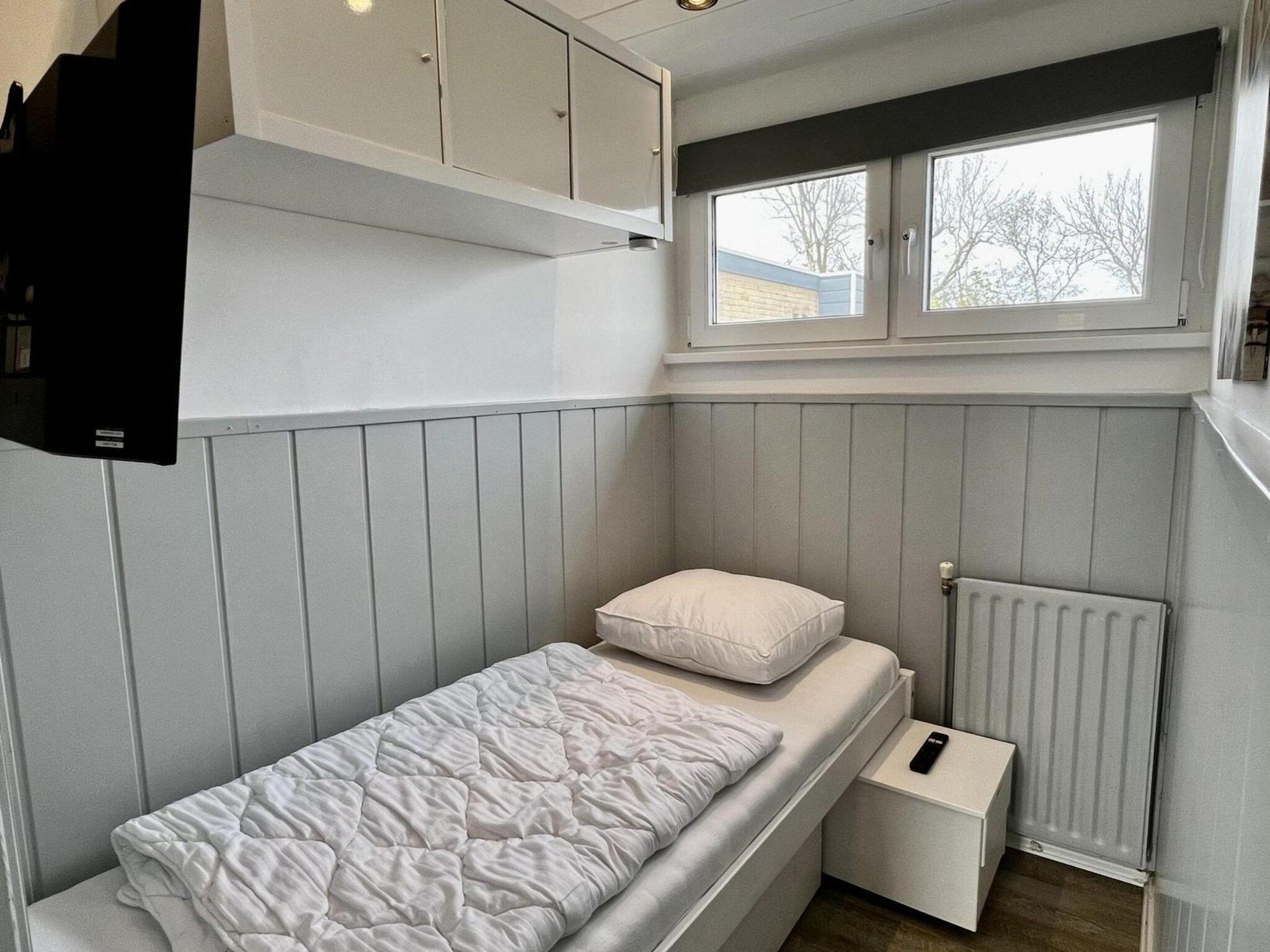 Een slaapkamer van De Schelp 27 in Sint Maartenszee