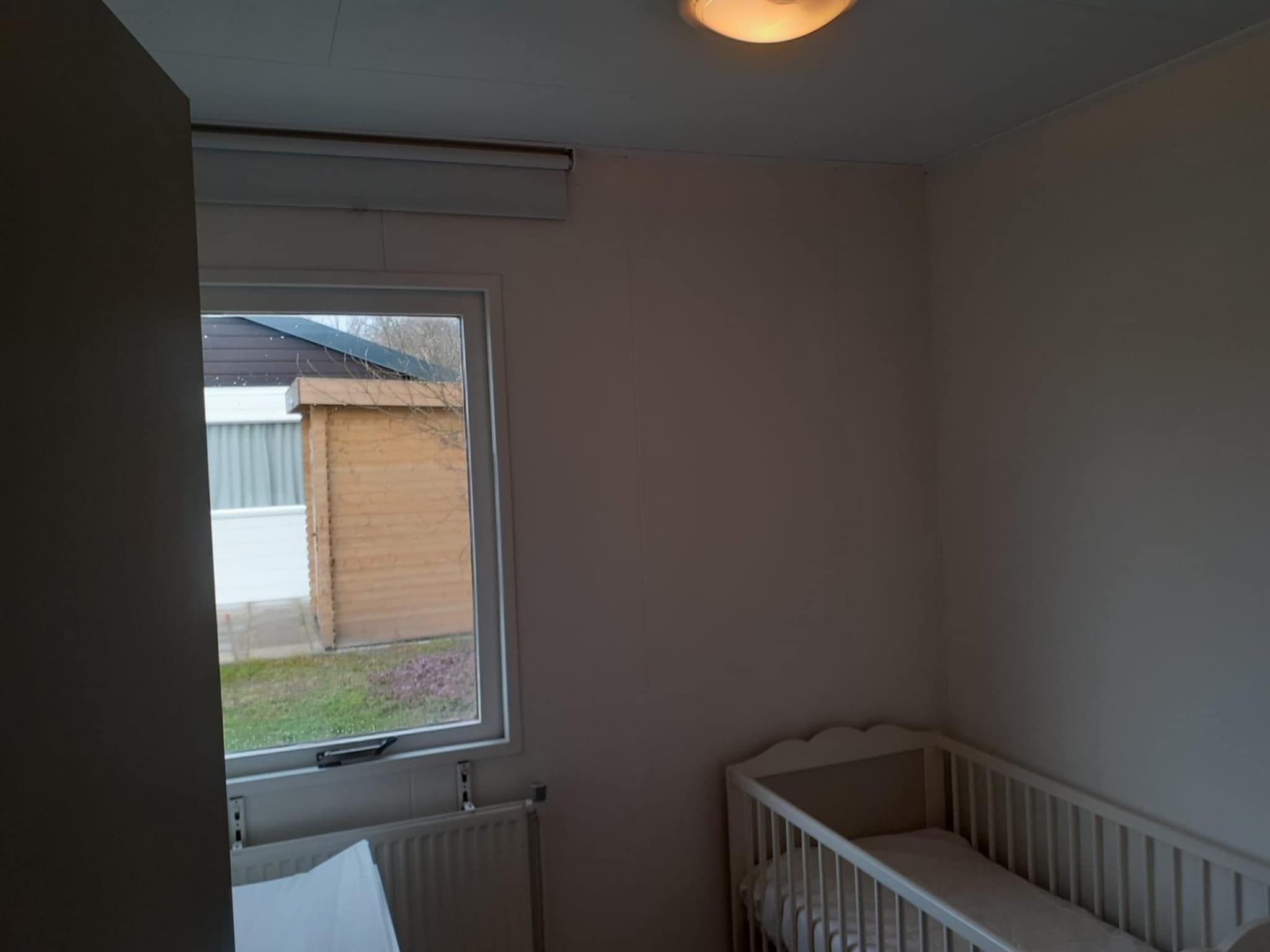 Een slaapkamer van Eb en Vloed 55 in Sint Maartenszee