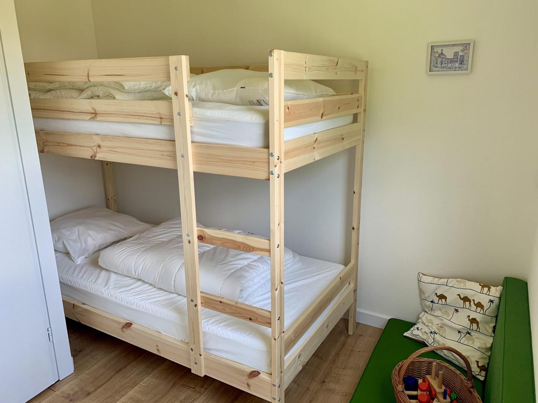 Een slaapkamer van Eb en Vloed 65 in Sint Maartenszee