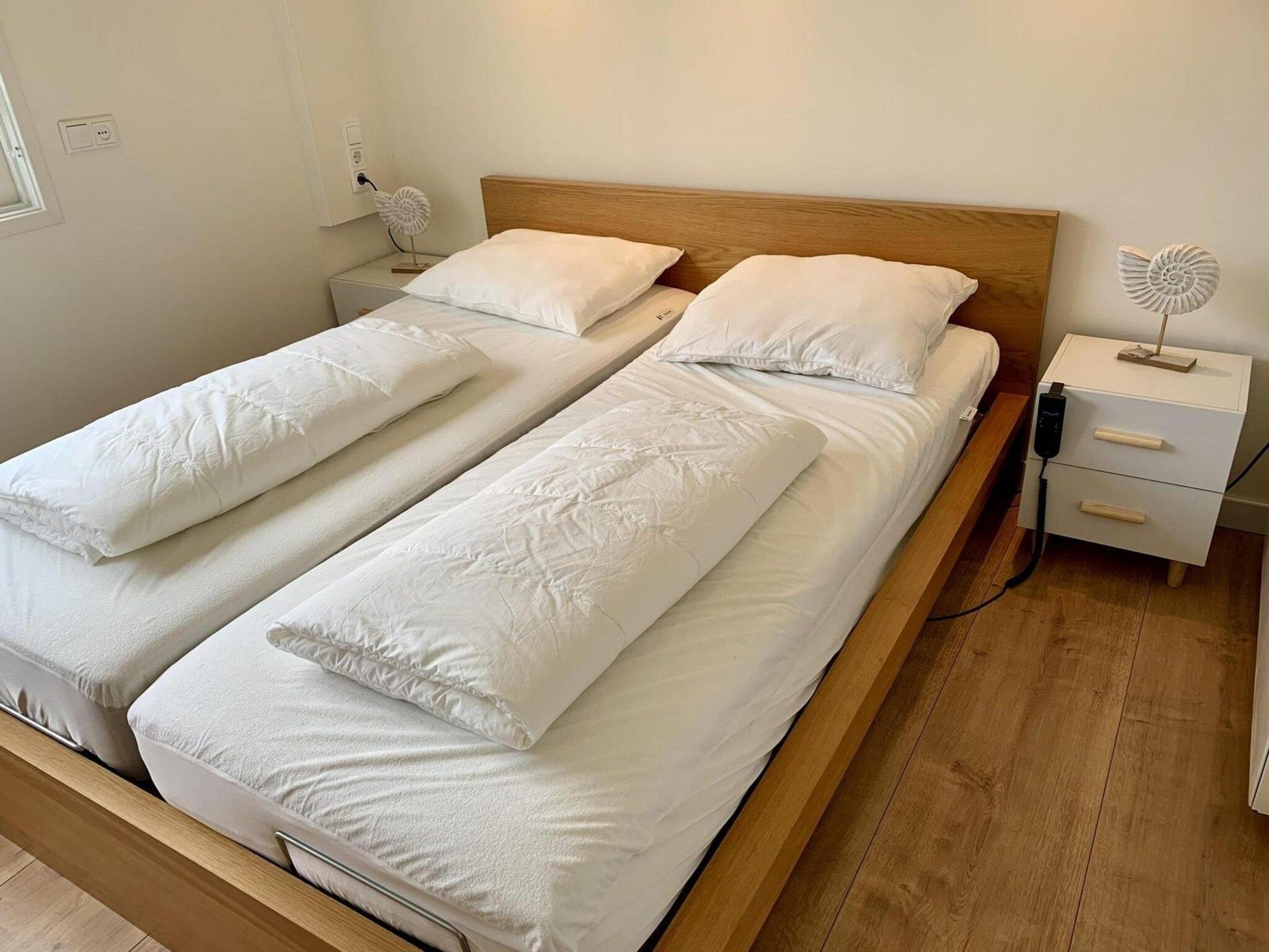 Een slaapkamer van Eb en Vloed 65 in Sint Maartenszee