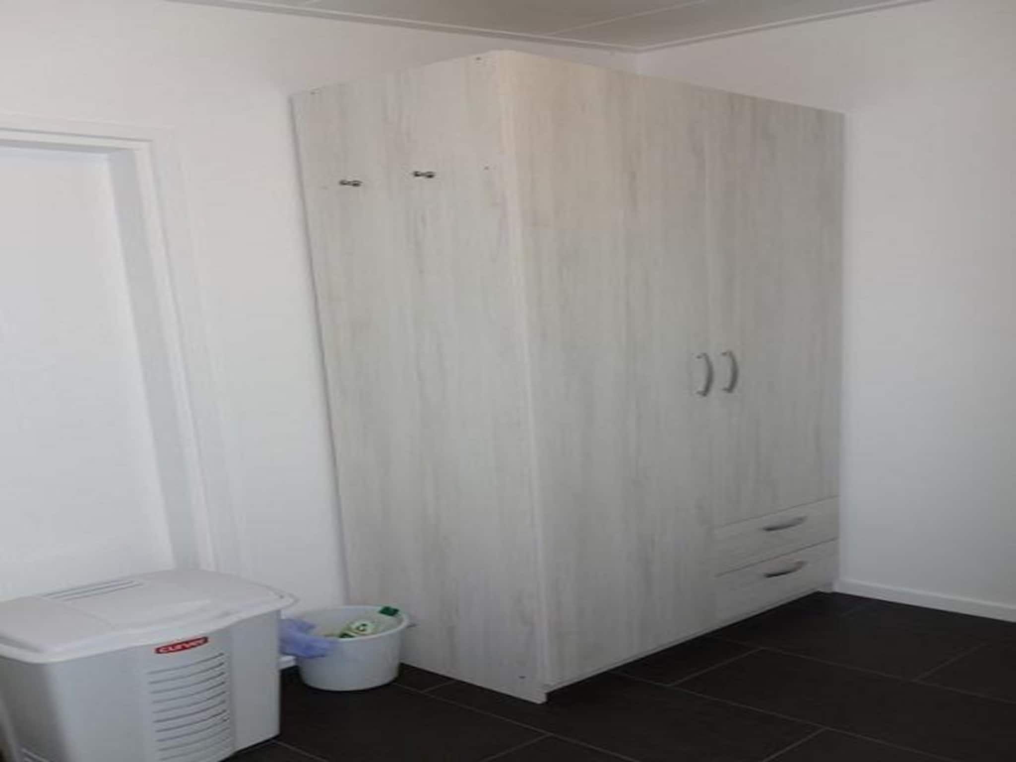 Een slaapkamer van Eureka 032 in Sint Maartenszee