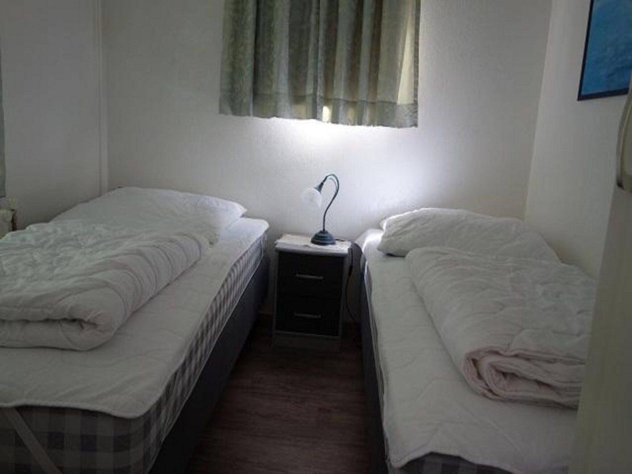 Een slaapkamer van Eureka 032 in Sint Maartenszee