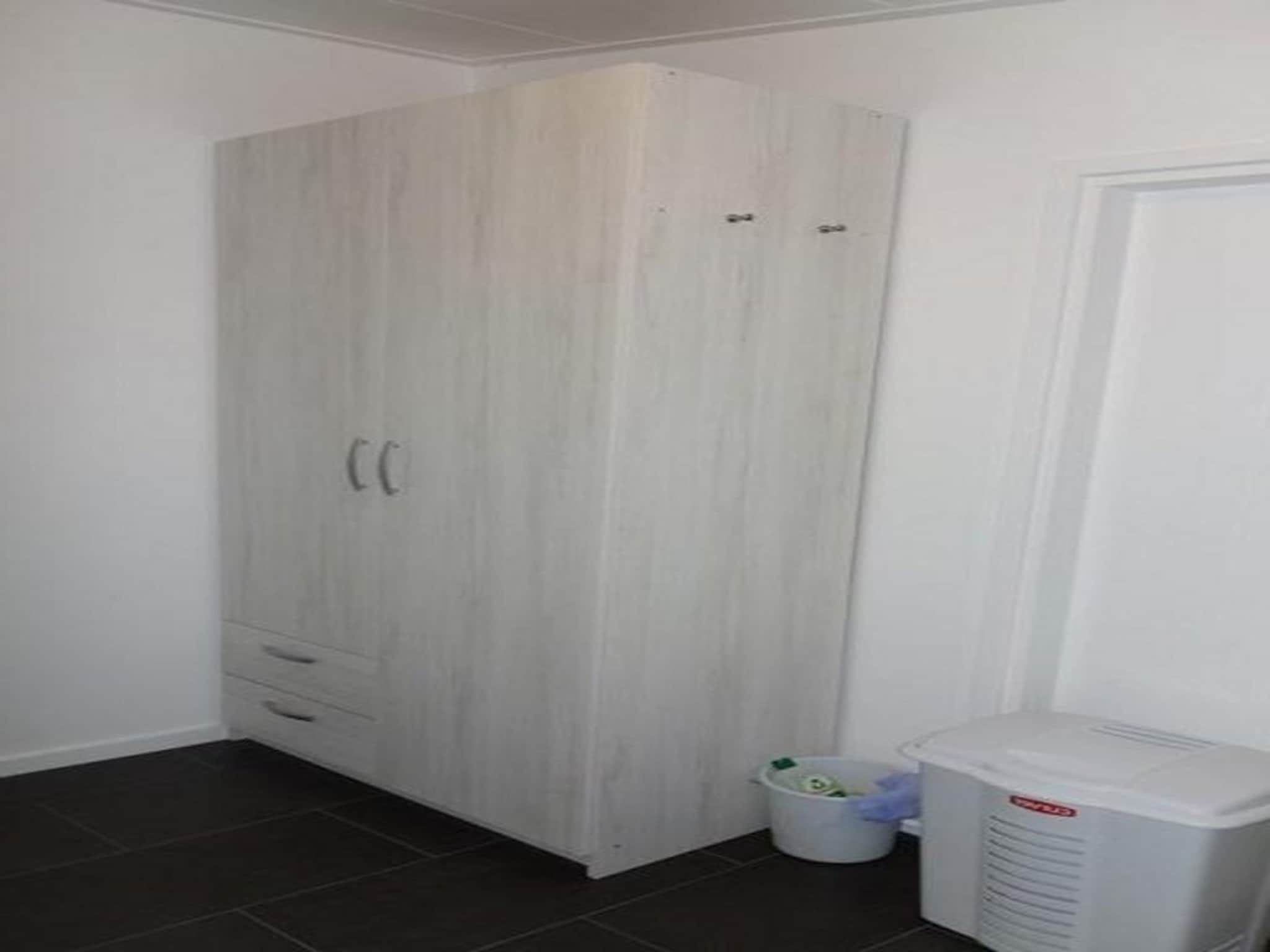 Een slaapkamer van Eureka 032 in Sint Maartenszee