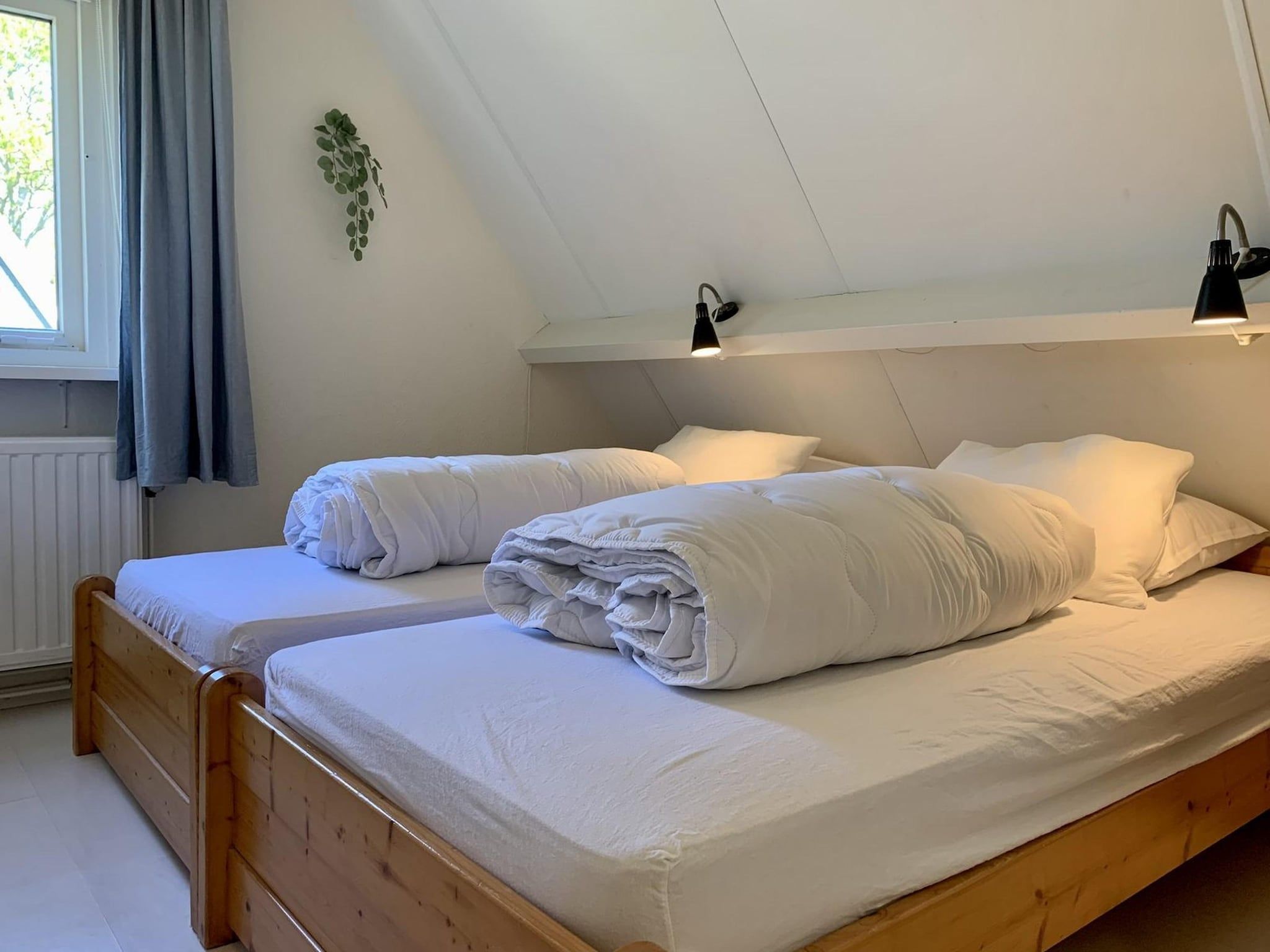 Een slaapkamer van Gudea 5 in Sint Maartensbrug