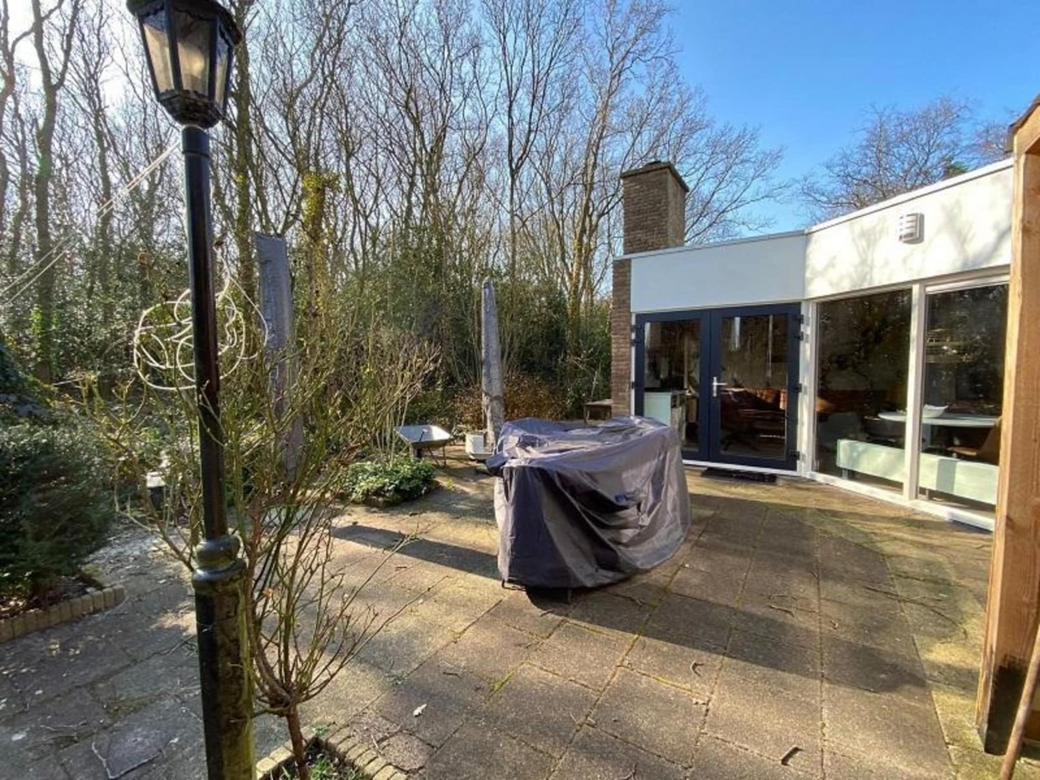 Het terras van Kloosterbos 4 in Sint Maartensbrug