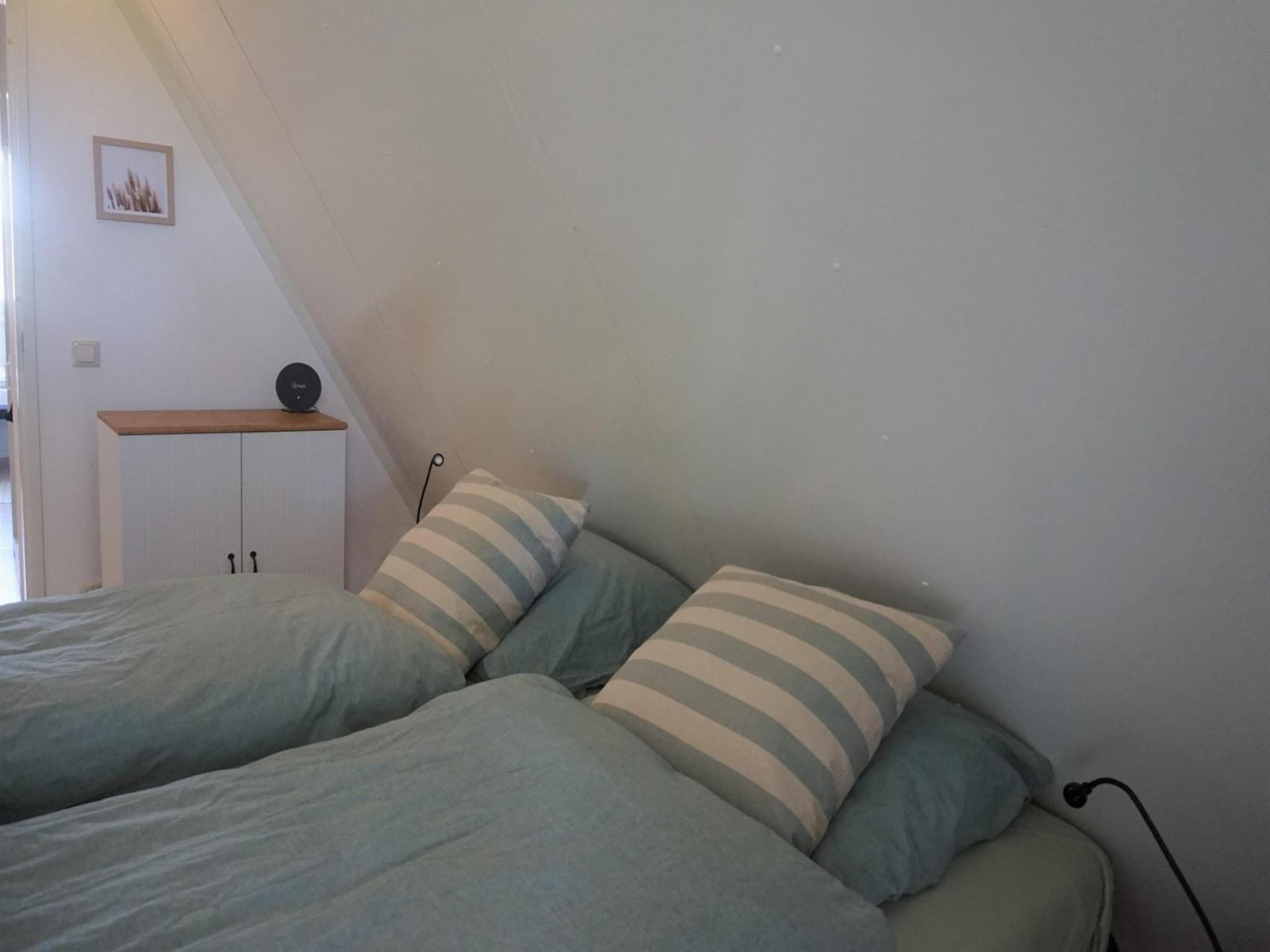 Een slaapkamer van Vogelvrij 4 in Burgerbrug