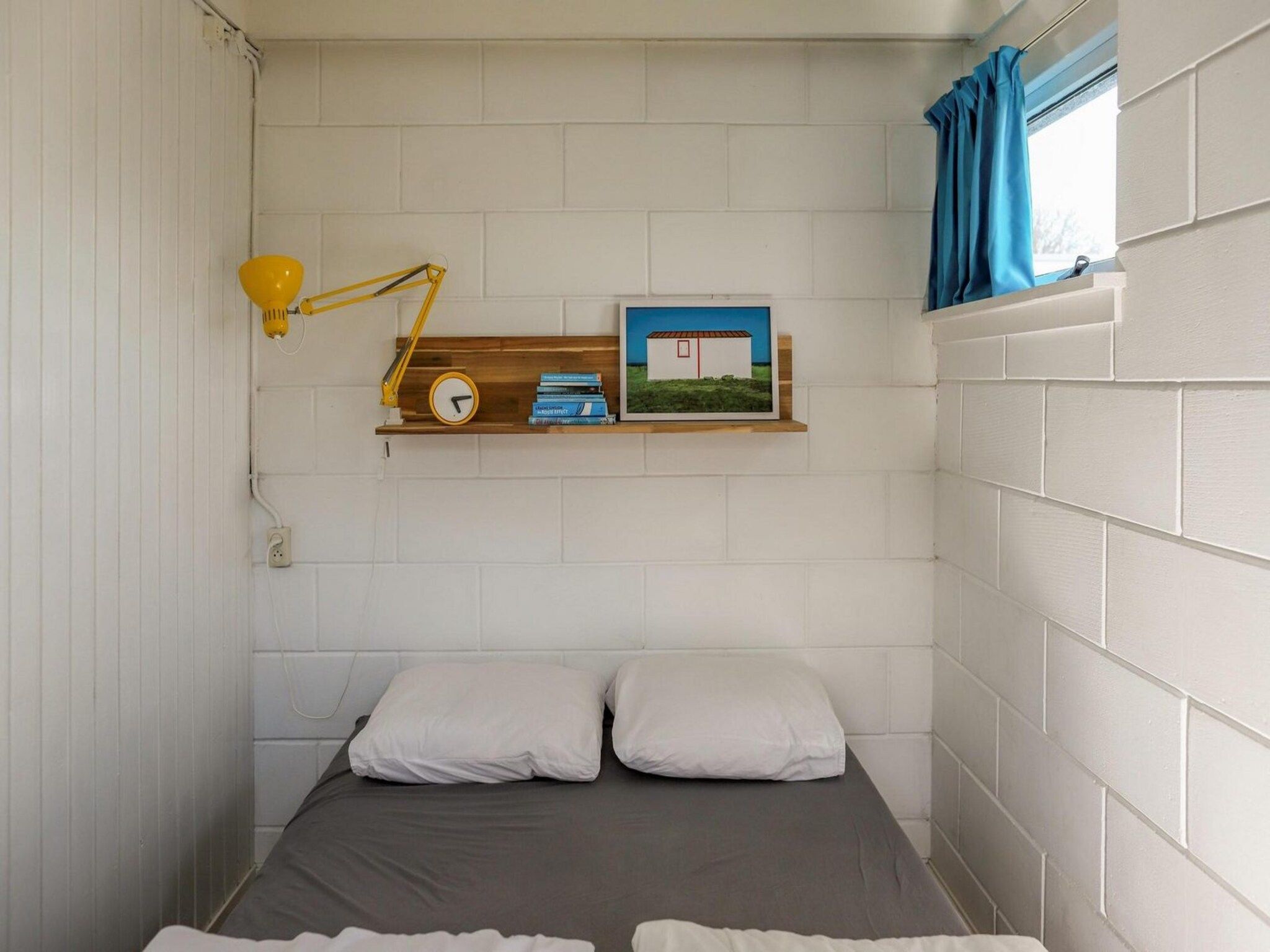 Een slaapkamer van Wildrijk 21 in Sint Maartenszee