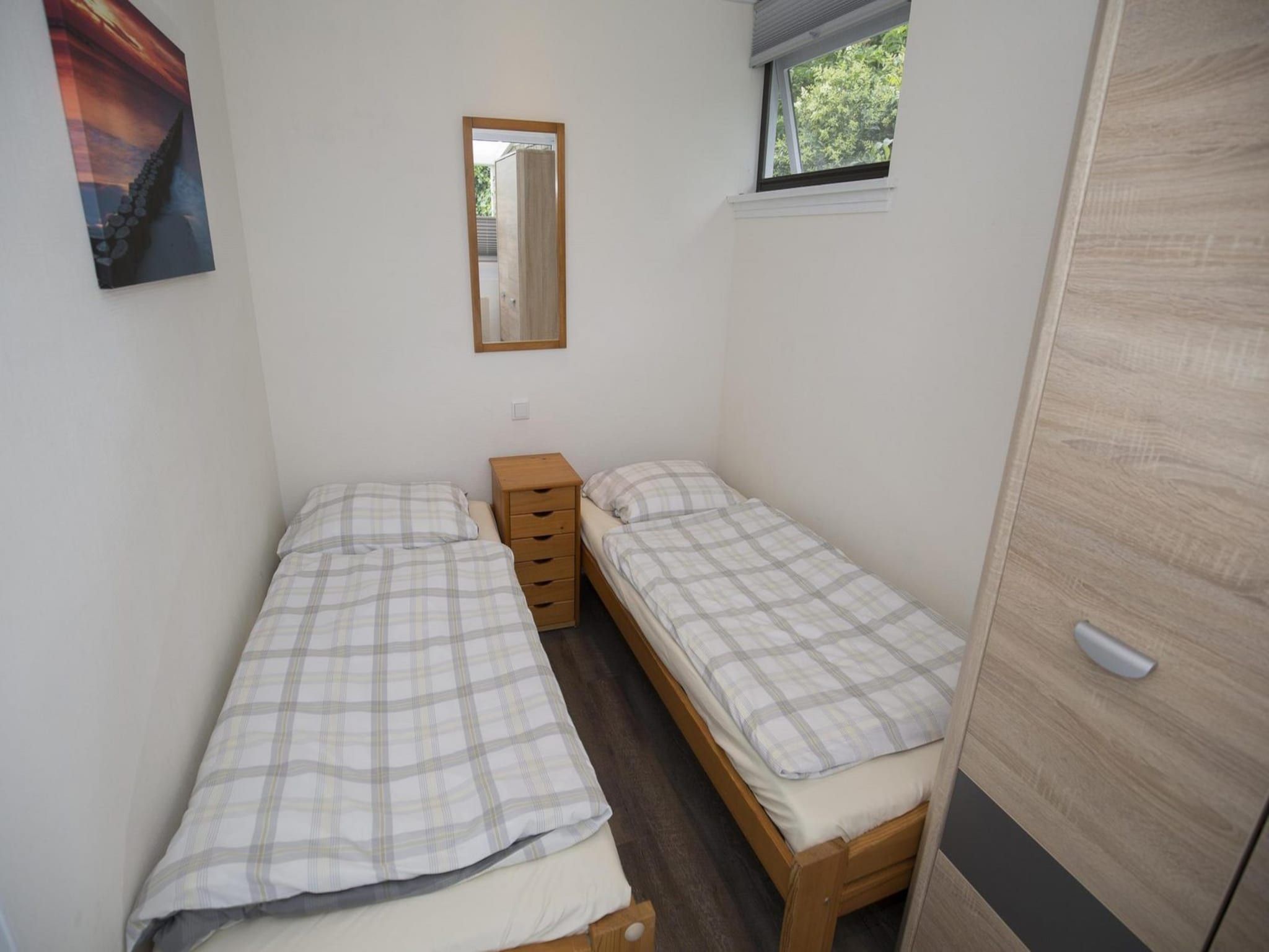 Een slaapkamer van Wildrijk 035 in Sint Maartenszee