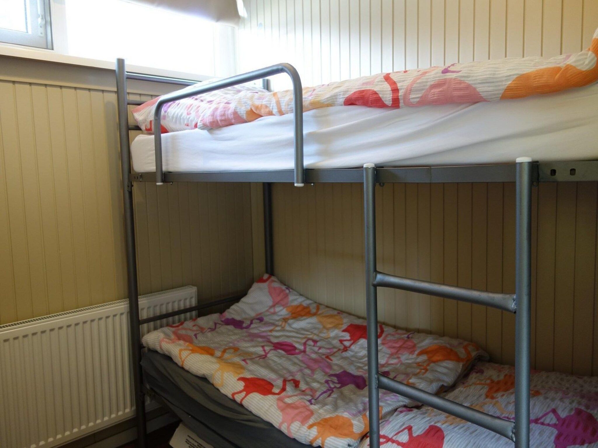 Een slaapkamer van Wildrijk 050 in Sint Maartenszee