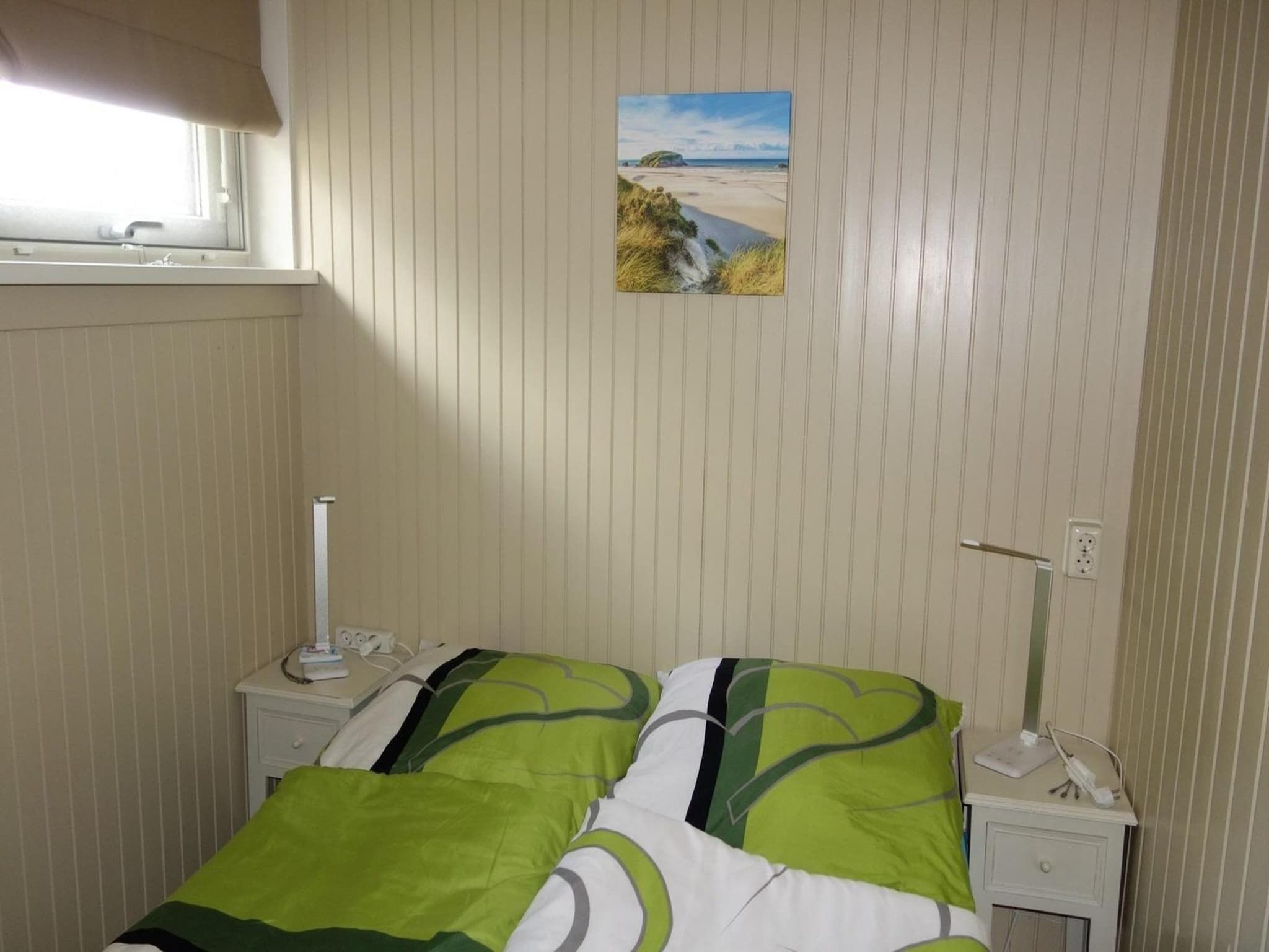 Een slaapkamer van Wildrijk 050 in Sint Maartenszee
