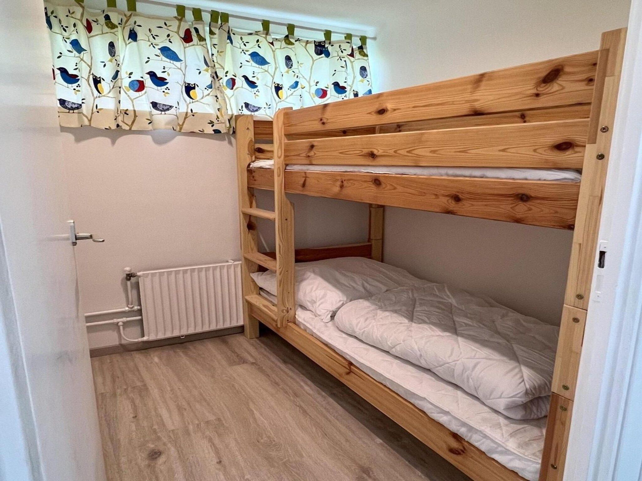 Een slaapkamer van Wildrijk 072 in Sint Maartenszee
