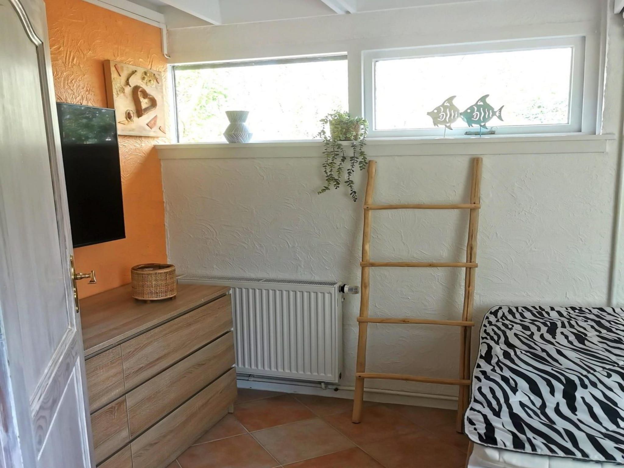 Een slaapkamer van Wildrijk 108 in Sint Maartenszee