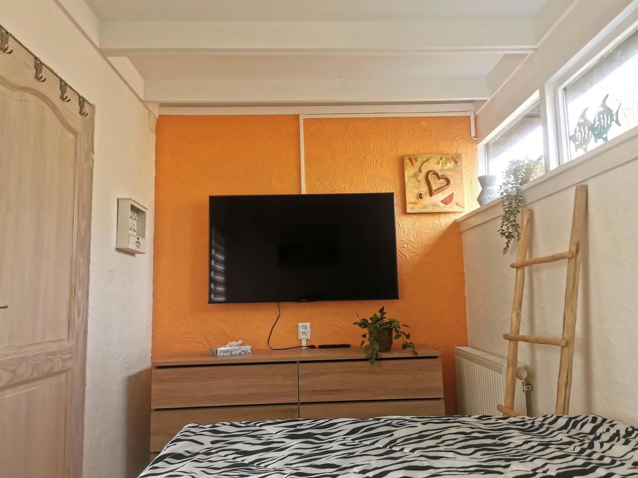 Een slaapkamer van Wildrijk 108 in Sint Maartenszee