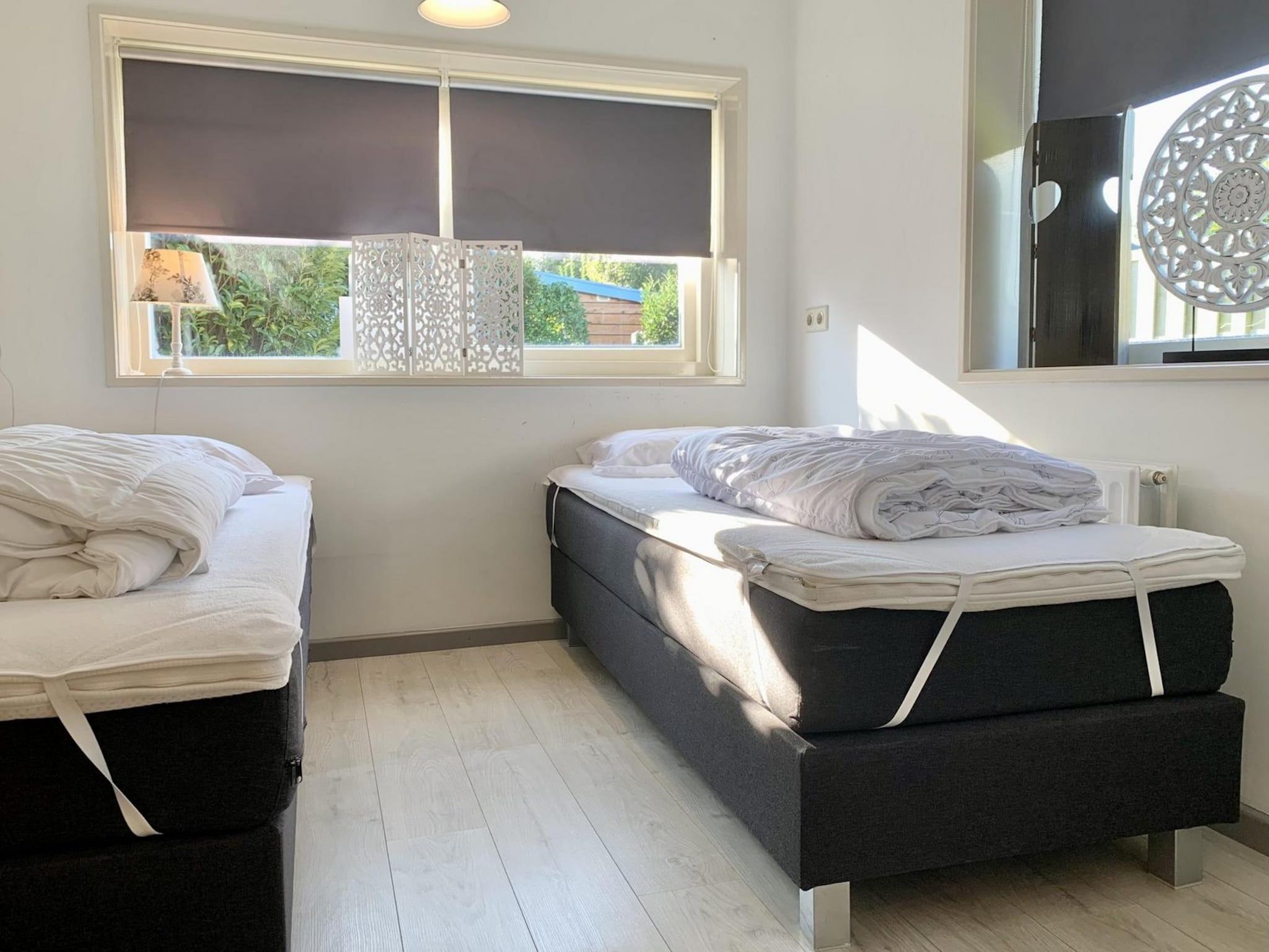 Een slaapkamer van Zeewaard 21 in Sint Maartenszee