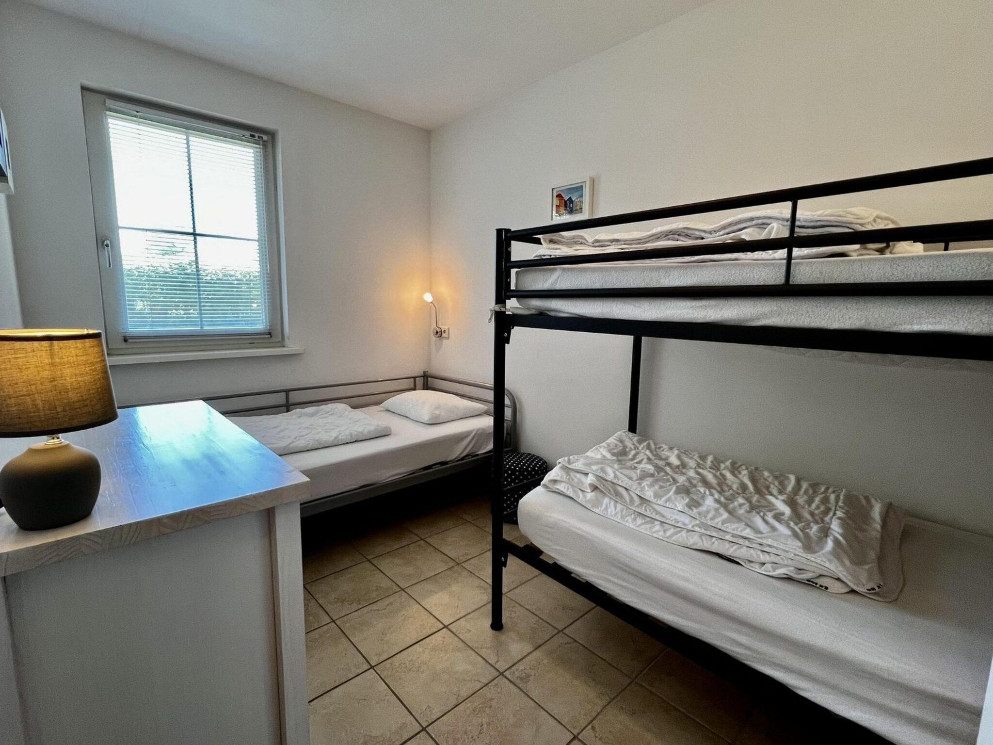 Een slaapkamer van Eureka 100 in Sint Maartenszee