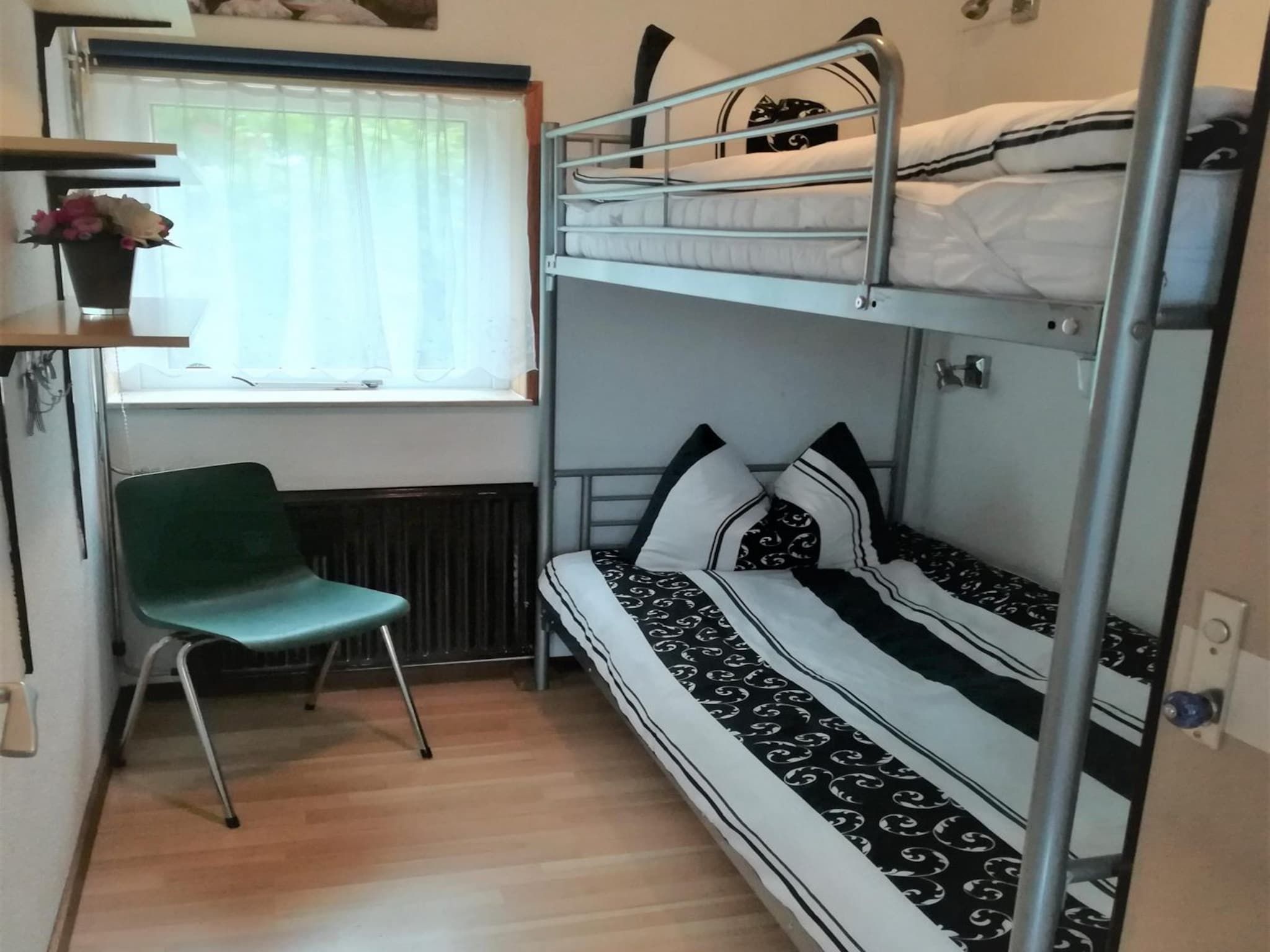 Een slaapkamer van Zeewaard 20 in Sint Maartenszee