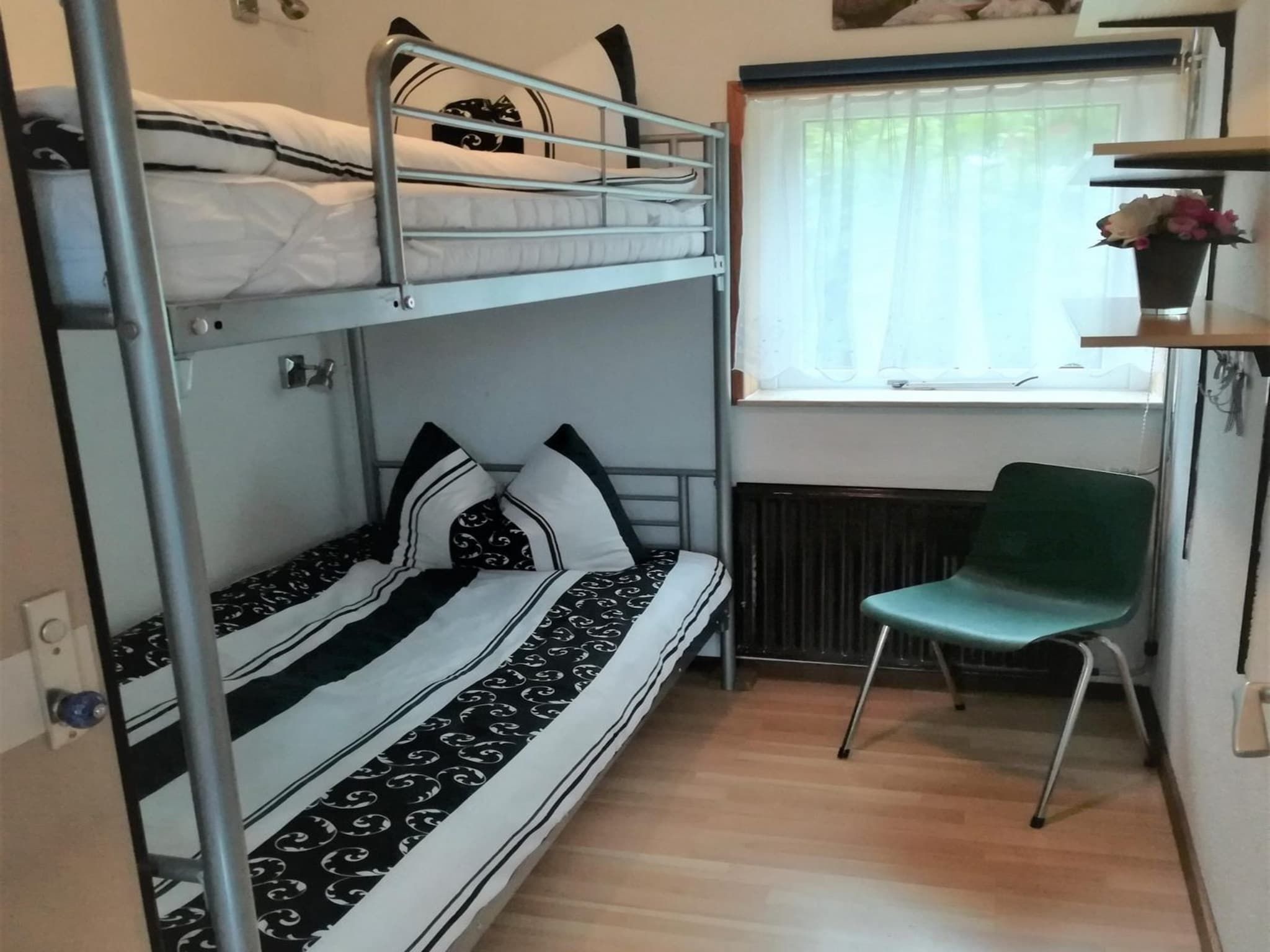 Een slaapkamer van Zeewaard 20 in Sint Maartenszee
