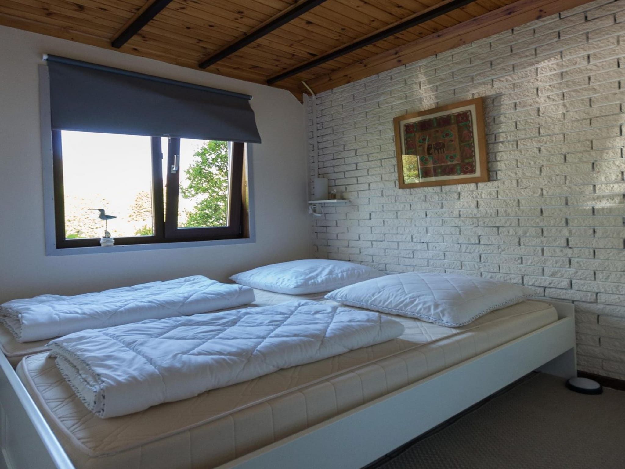 Een slaapkamer van Belkmerduinen 01 in Sint Maartenszee