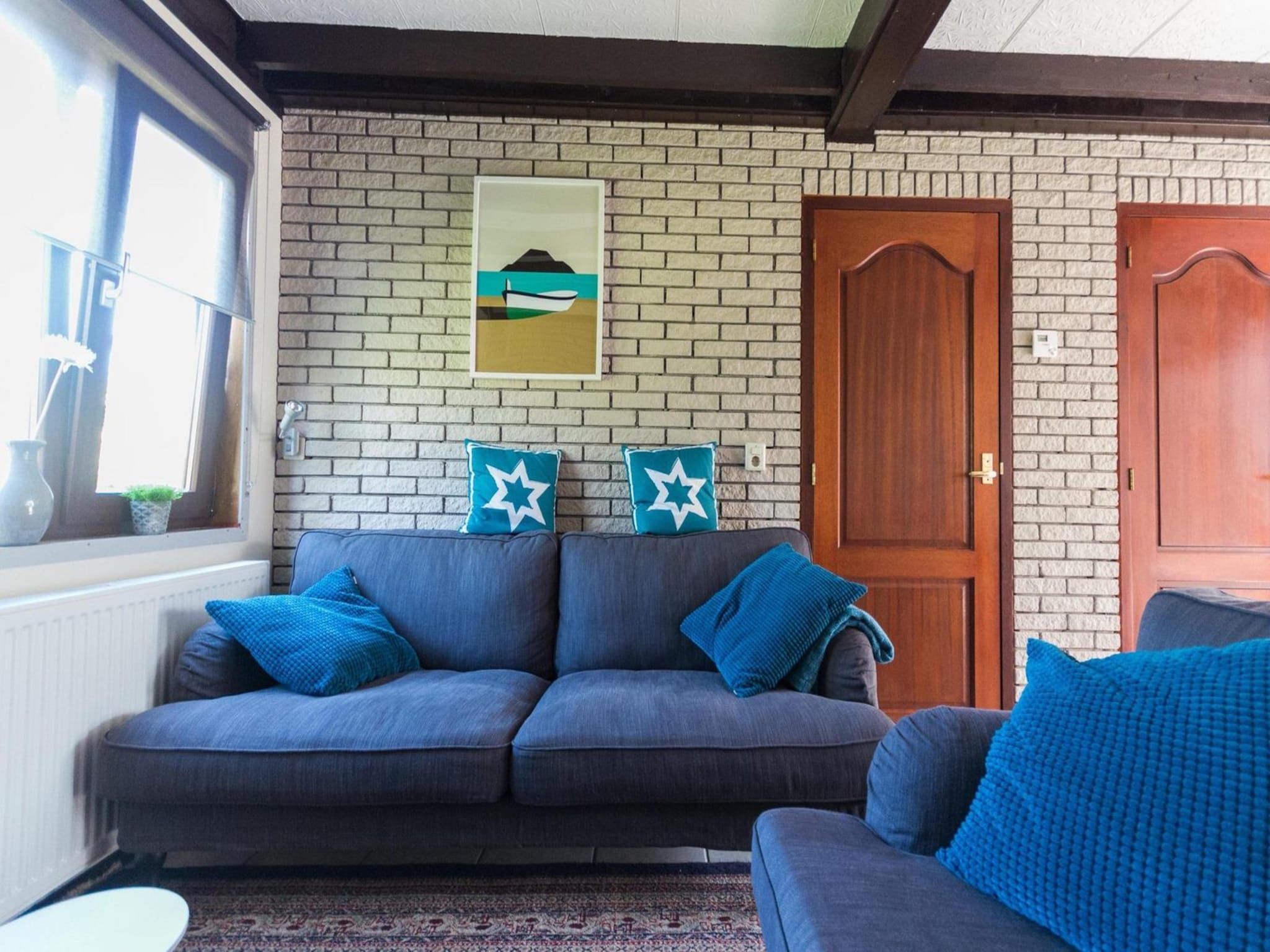 De woonkamer van Belkmerduinen 01 in Sint Maartenszee