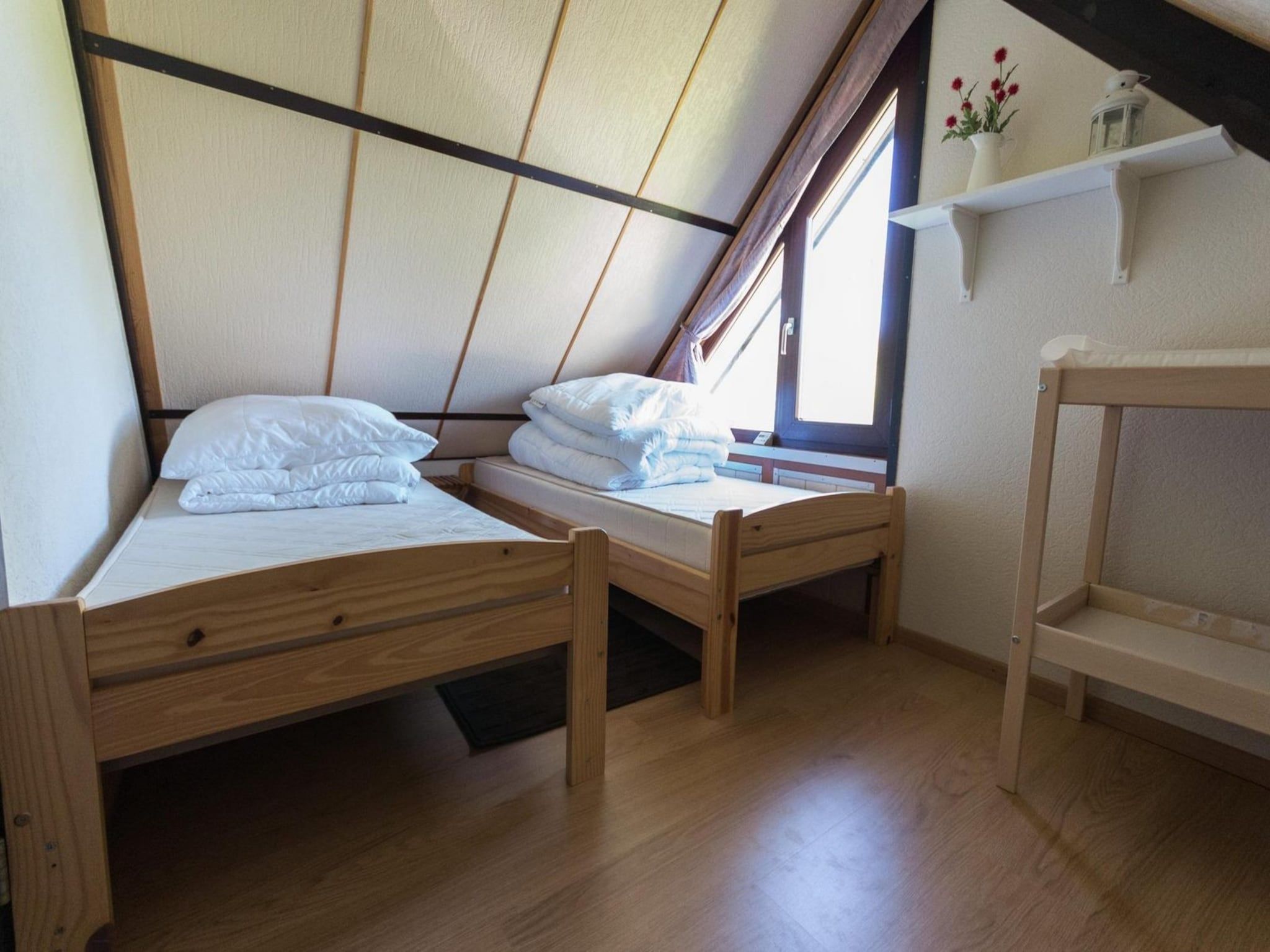 Een slaapkamer van Belkmerduinen 01 in Sint Maartenszee