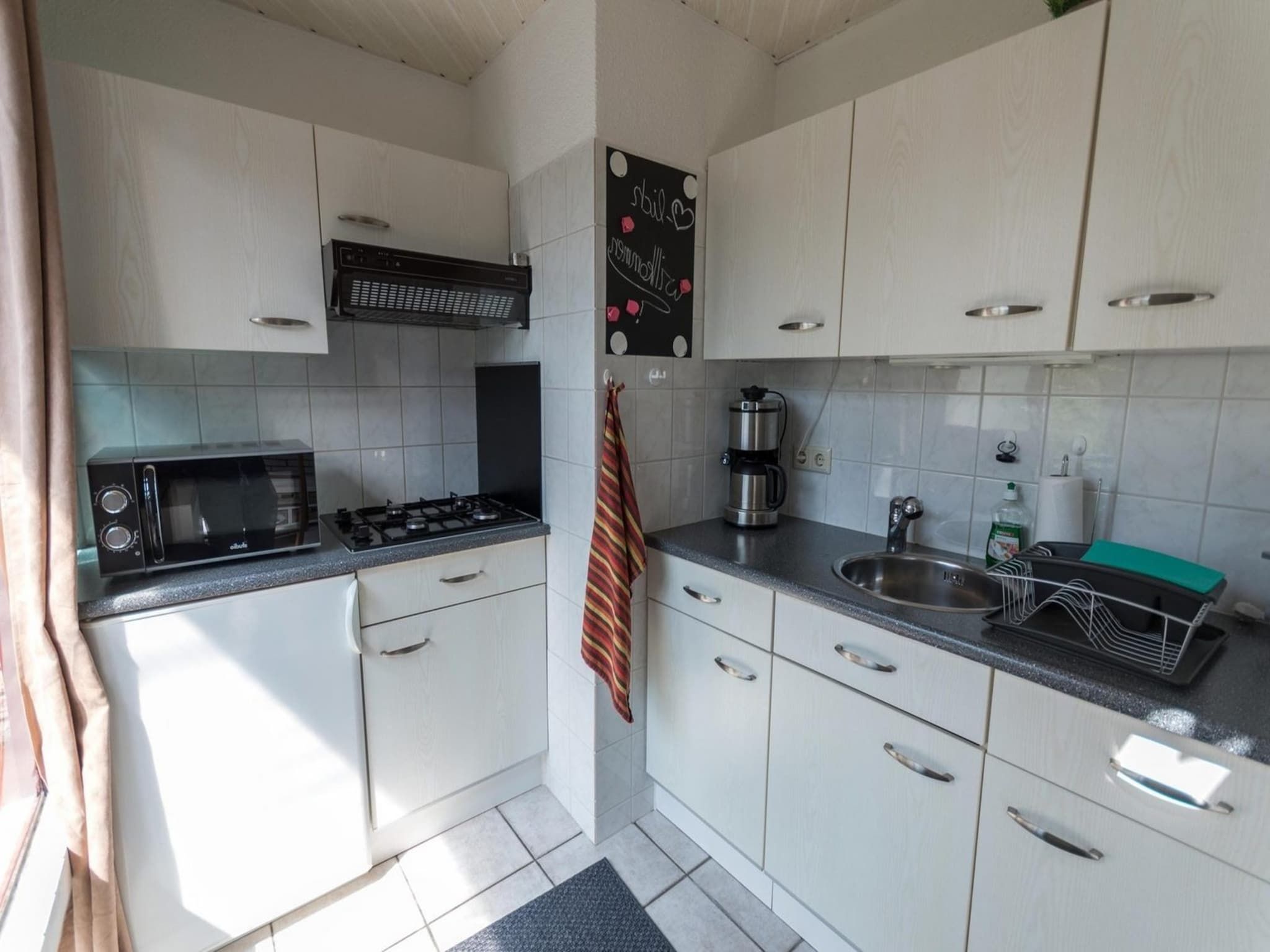 De woonkamer van Belkmerduinen 01 in Sint Maartenszee