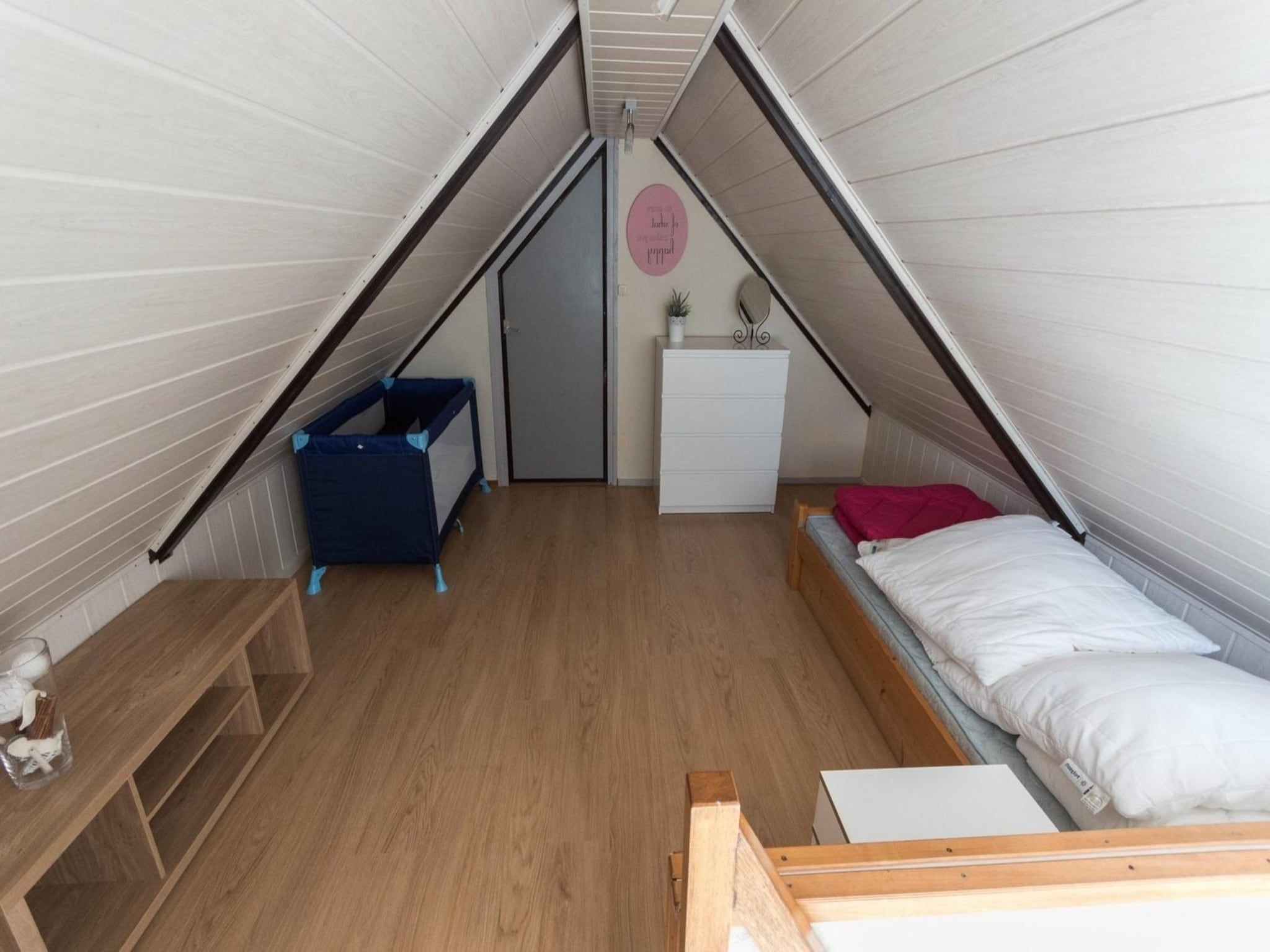 Een slaapkamer van Belkmerduinen 01 in Sint Maartenszee
