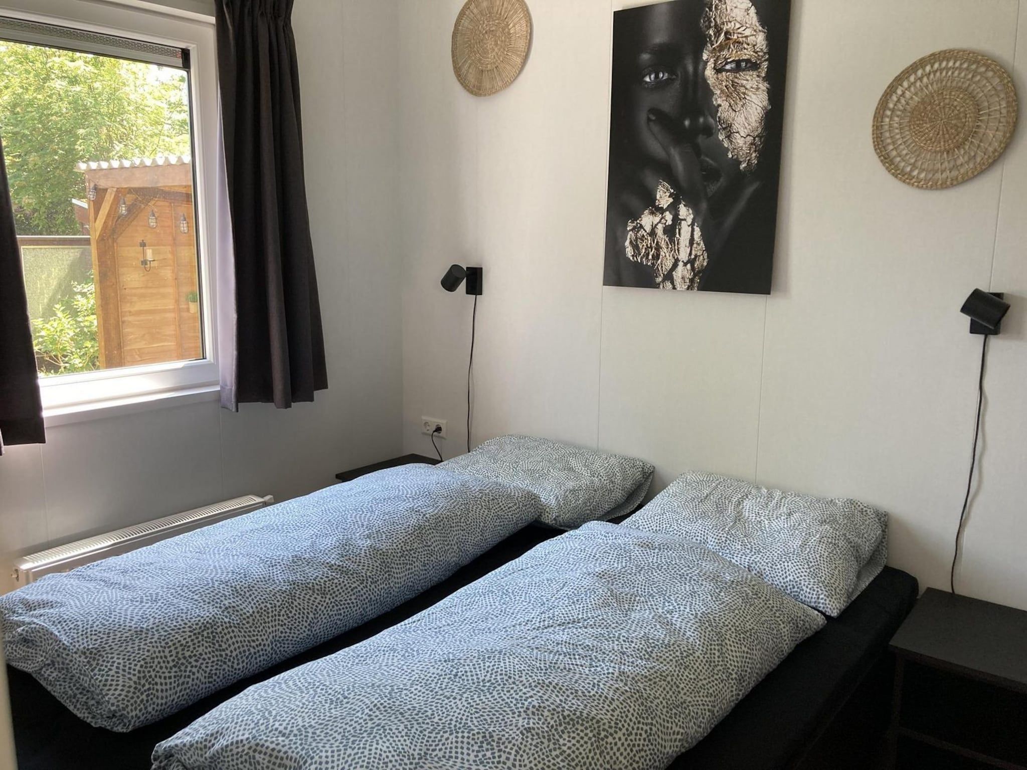 Een slaapkamer van Campanula 225 in Sint Maartenszee