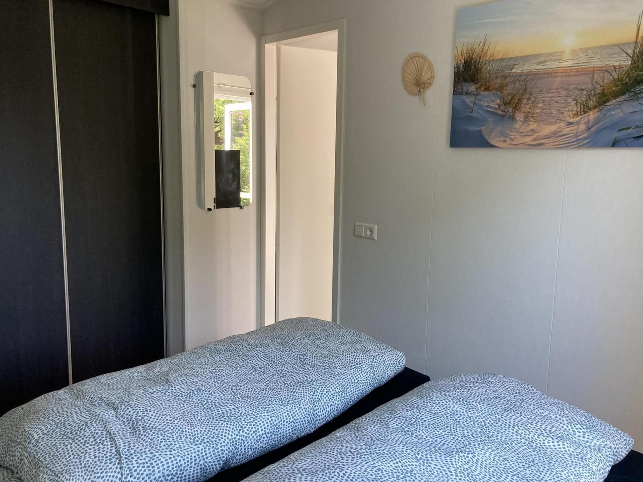Een slaapkamer van Campanula 225 in Sint Maartenszee